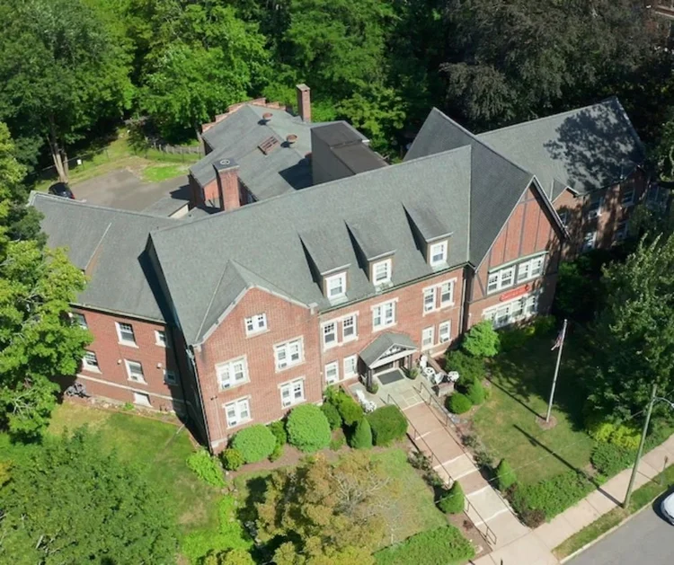 Aerial view of Southmayd Home's Tudor-style building on Columbia Boulevard in Waterbury