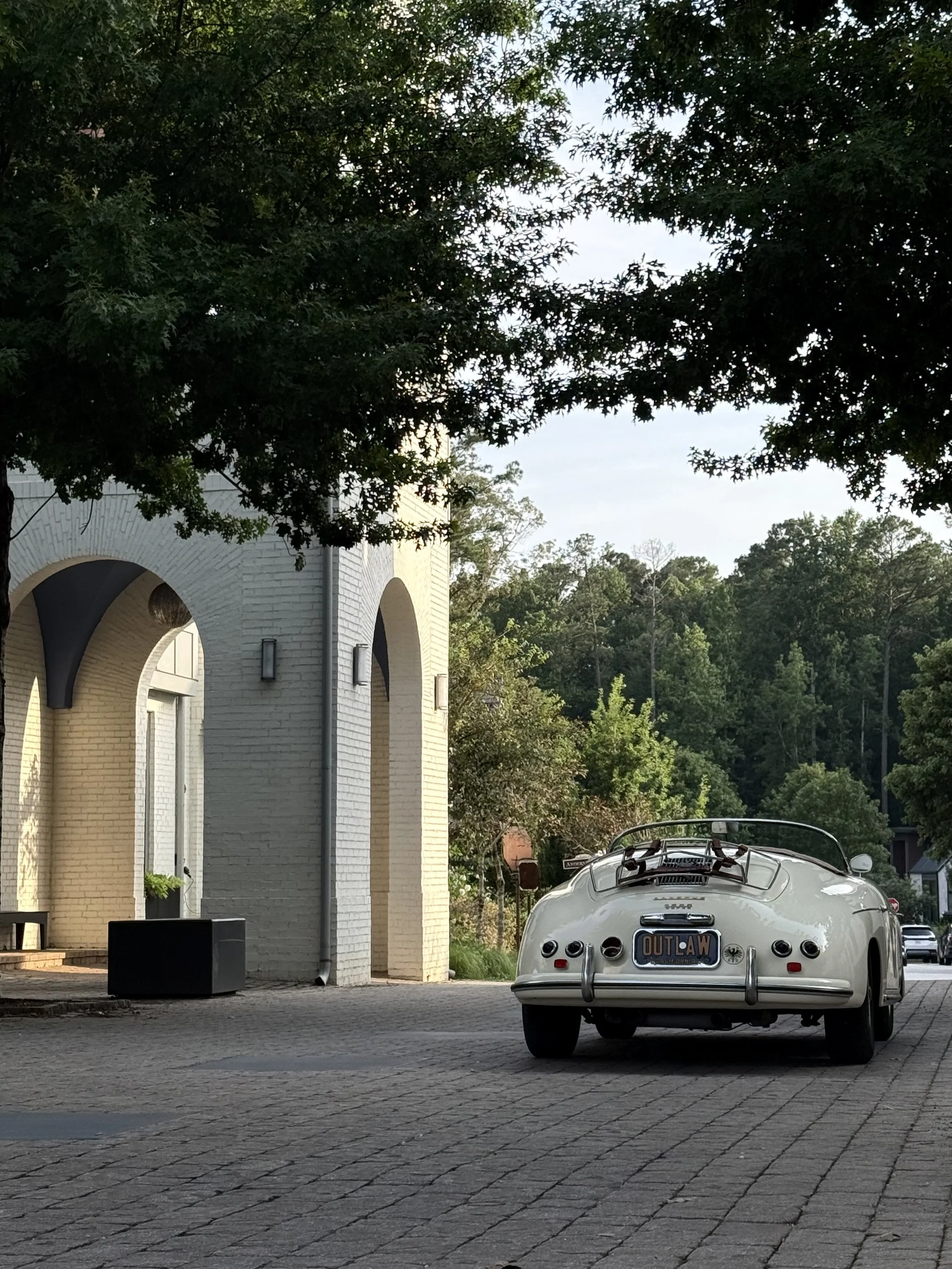 Rear view of vintage Porsche convertible with 'Just Married' sign, Georgia wedding