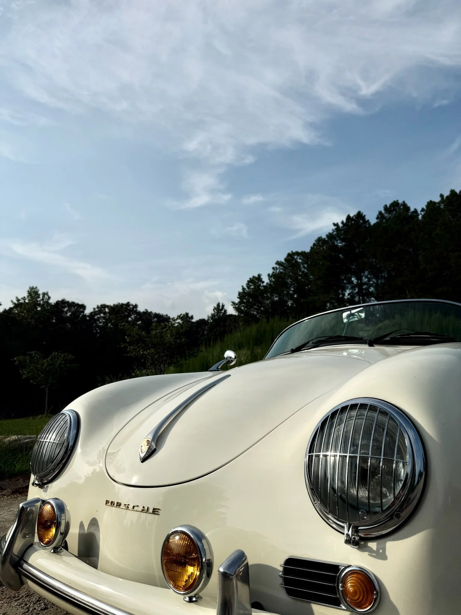 Front three-quarter view of cream 1957 Porsche 356 Speedster replica, Atlanta wedding rental