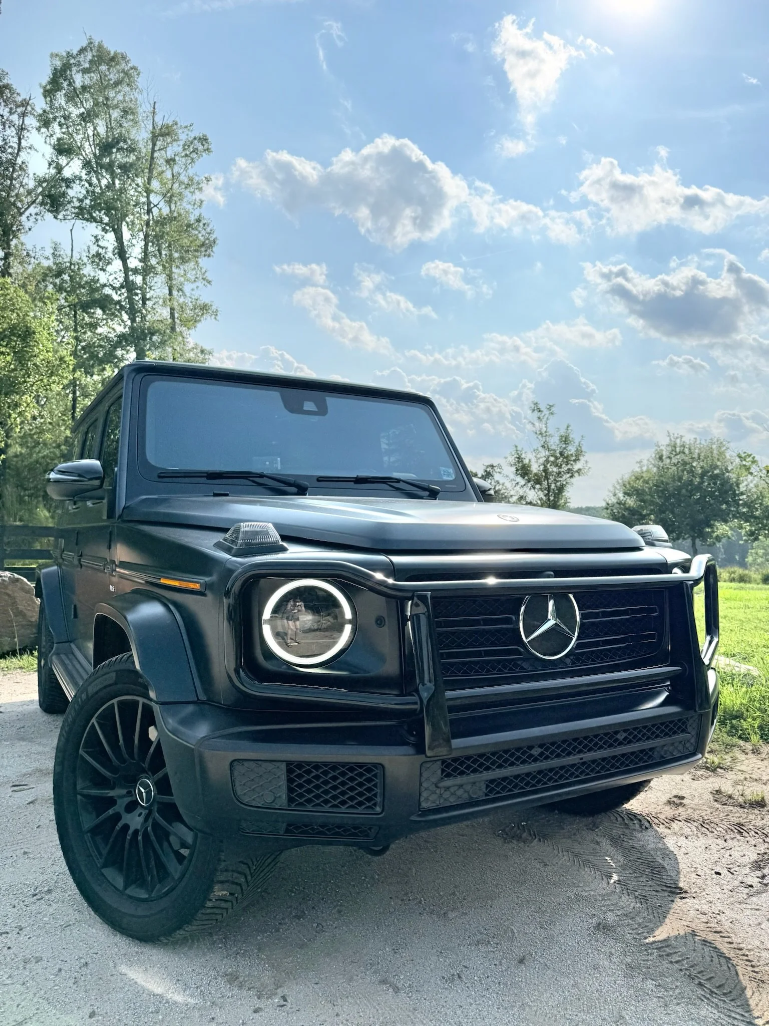 Front grille close-up of Mercedes G550 luxury SUV rental, Atlanta