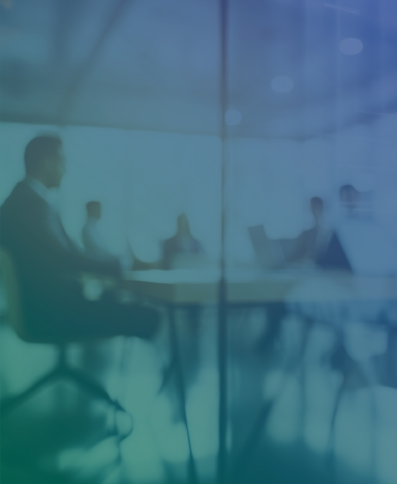 strategic partners from different firms sitting at desk having a business conversation