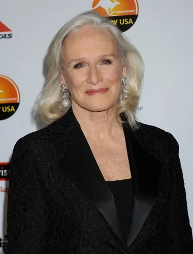 Actress Glen Close dressed in black jacket with satin lapel and black shirt