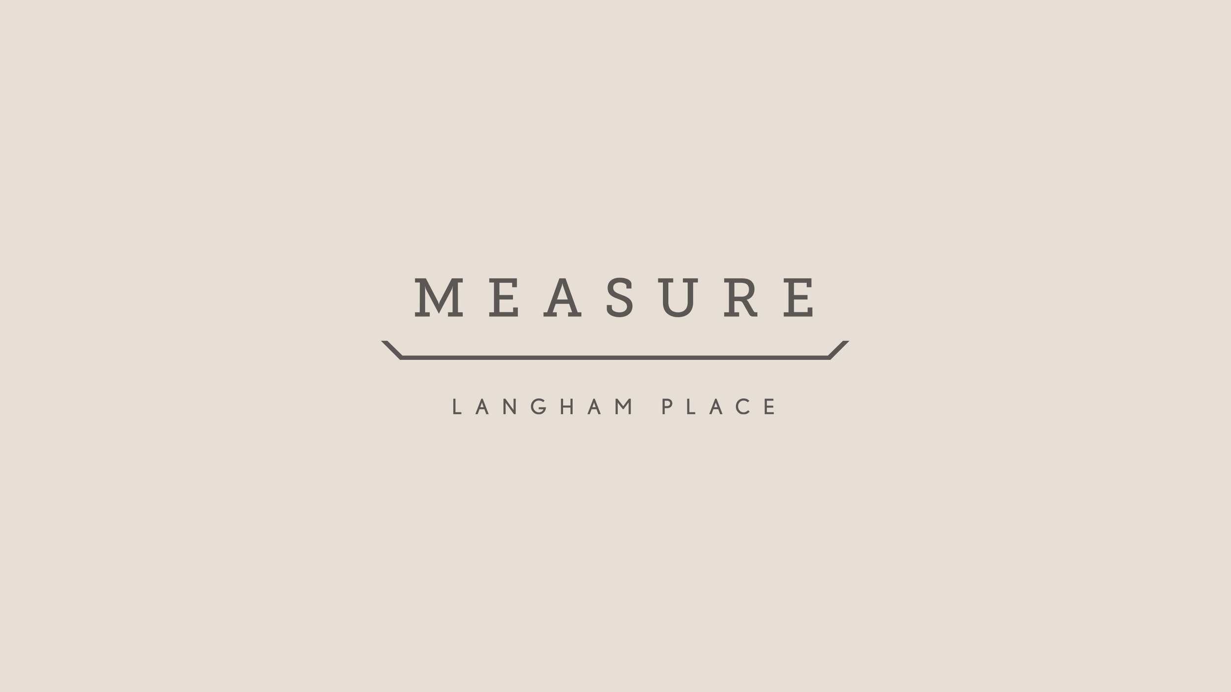Measure Langham Place wordmark with widely spaced serif lettering and a fine angular underline.