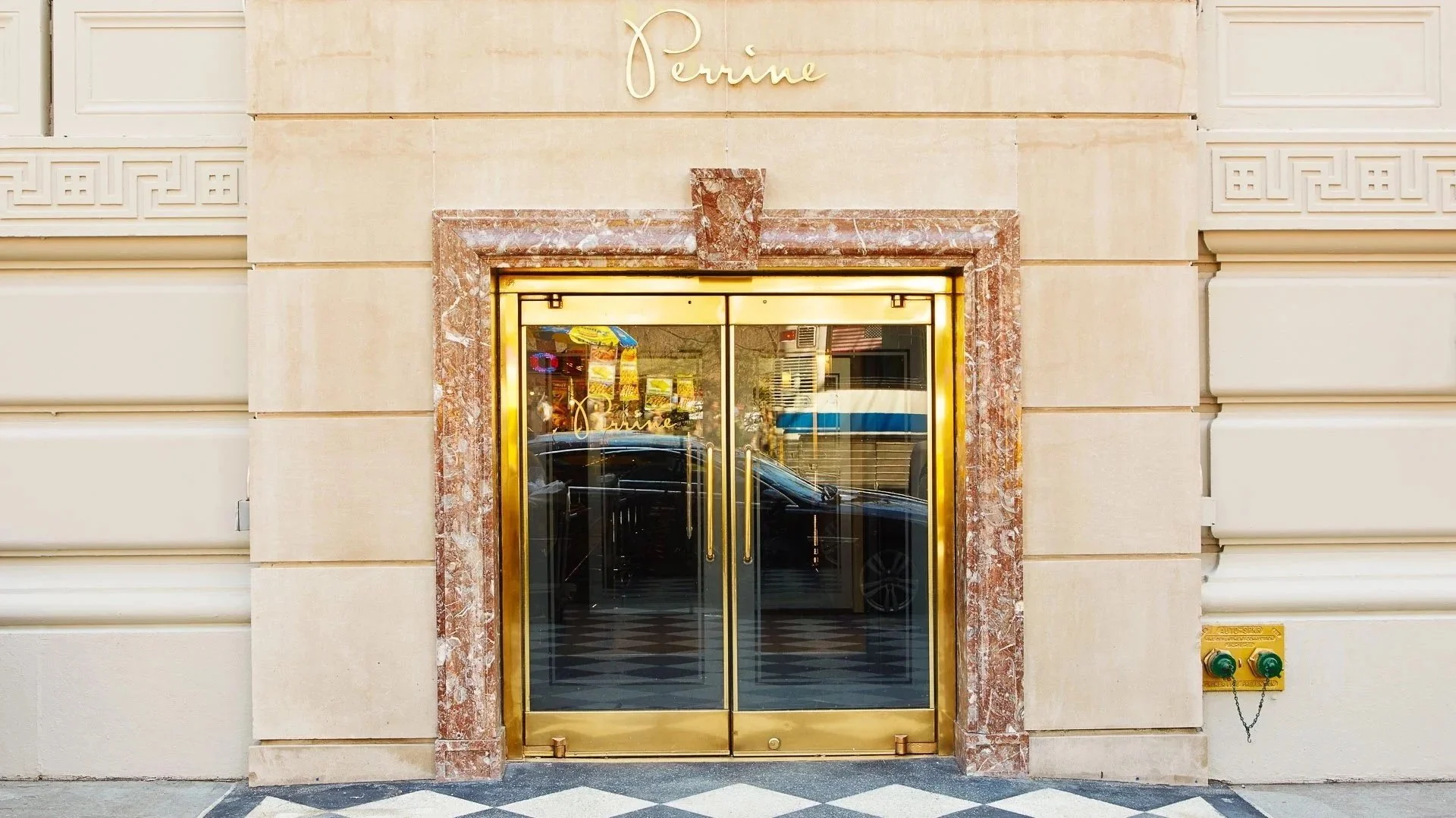 Perrine signage and hospitality brand applications at The Pierre New York.