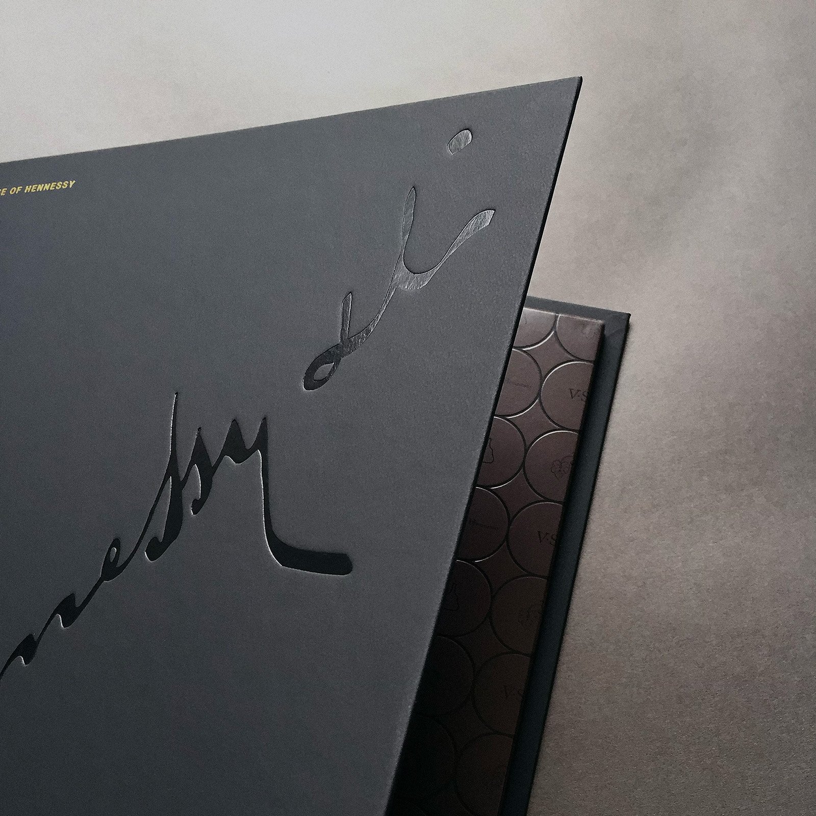 Hennessy brand book detail showing the House of Hennessy visual system.