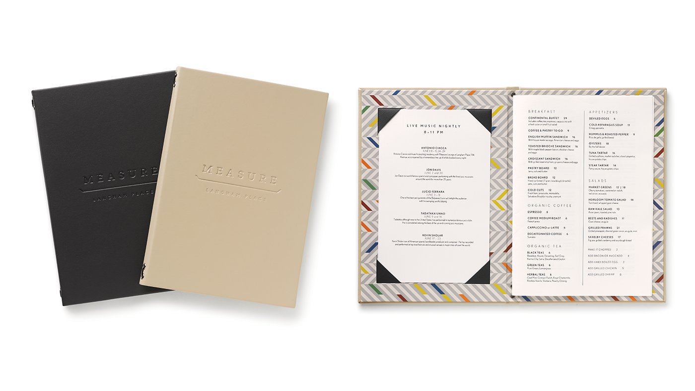 Measure menu system with gray and cream embossed covers, herringbone interiors and printed food and live-music inserts.