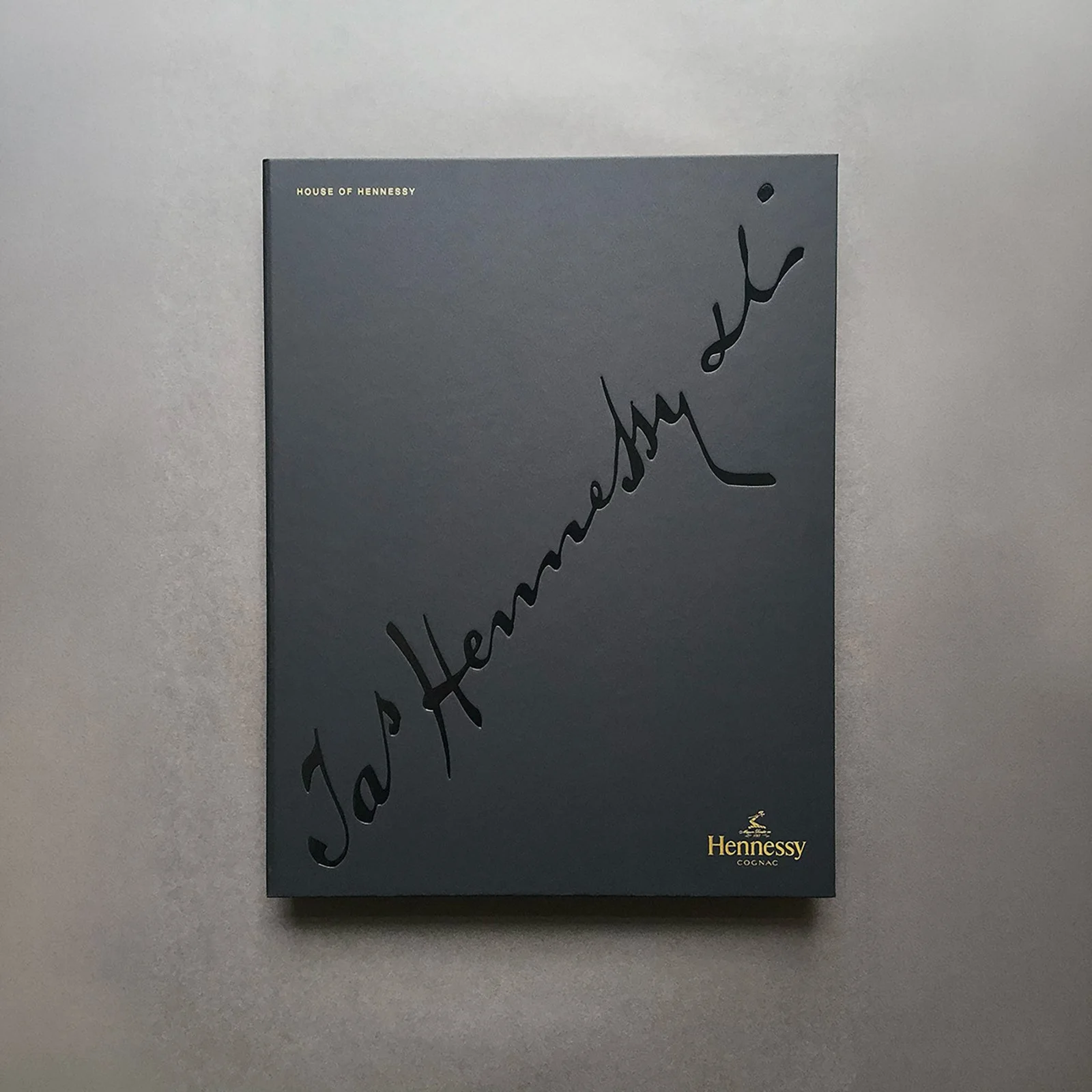 Cover of the Hennessy trade brand book.
