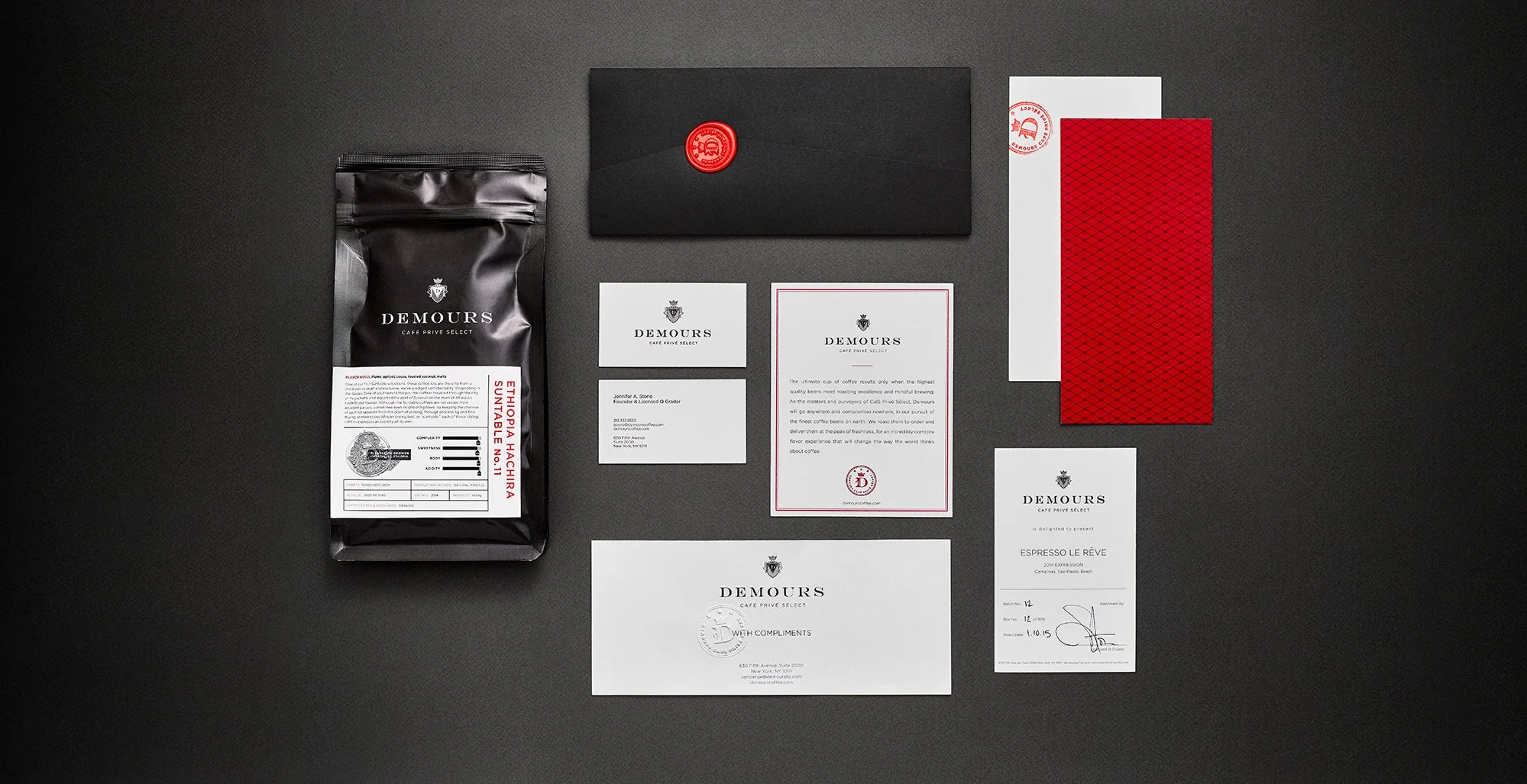 Demours Coffee packaging and stationery system in black, white and red.