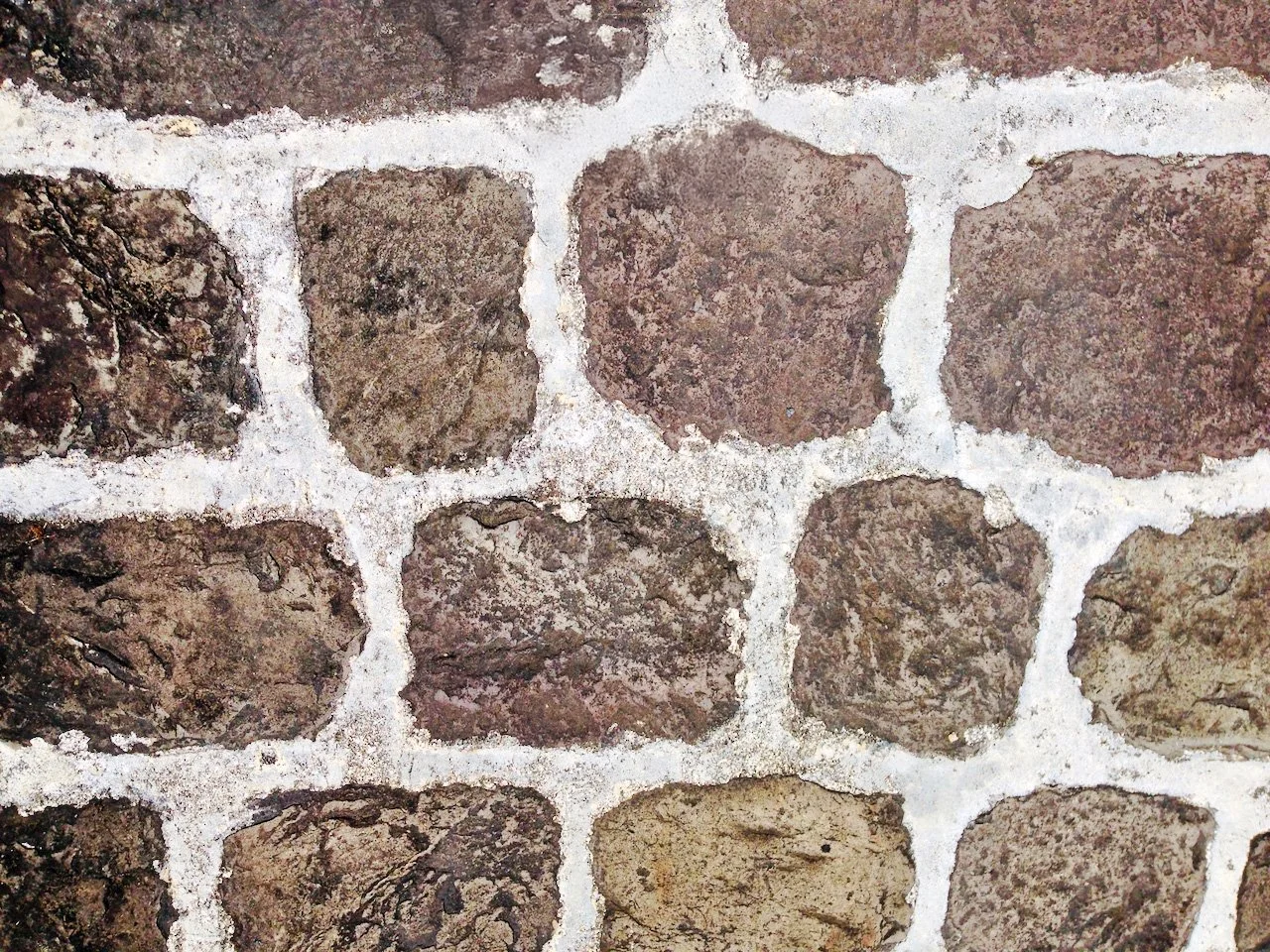Close-up of a stone wall photographed for the Belle Mont Farm visual story.