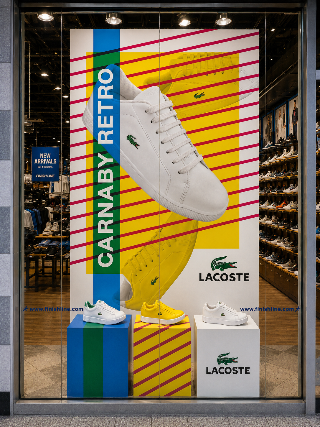 Lacoste Carnaby Retro campaign installed in a Finish Line window above color-coordinated shoe pedestals.