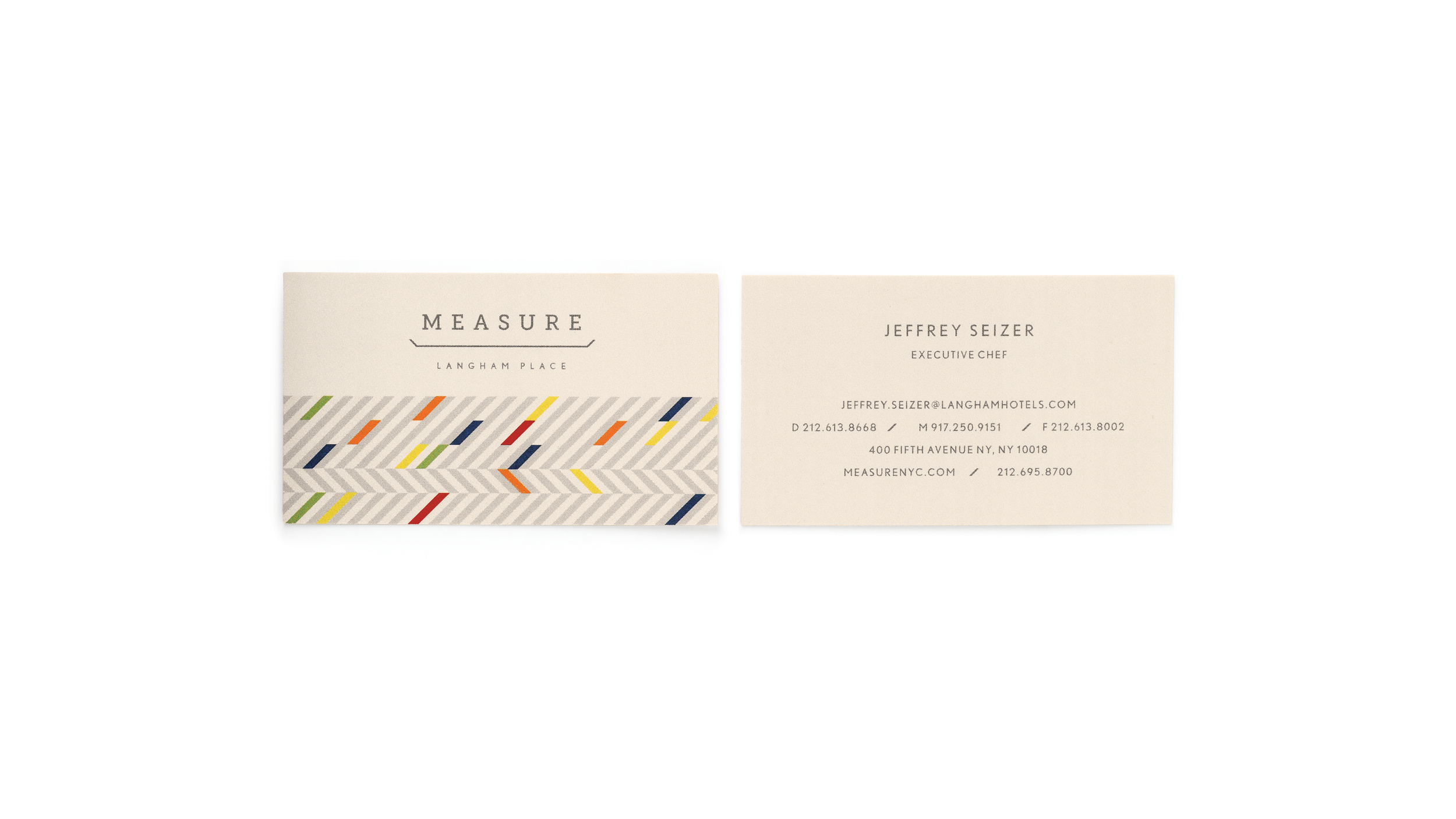 Measure Langham Place business card, front and back, with a multicolored herringbone pattern.