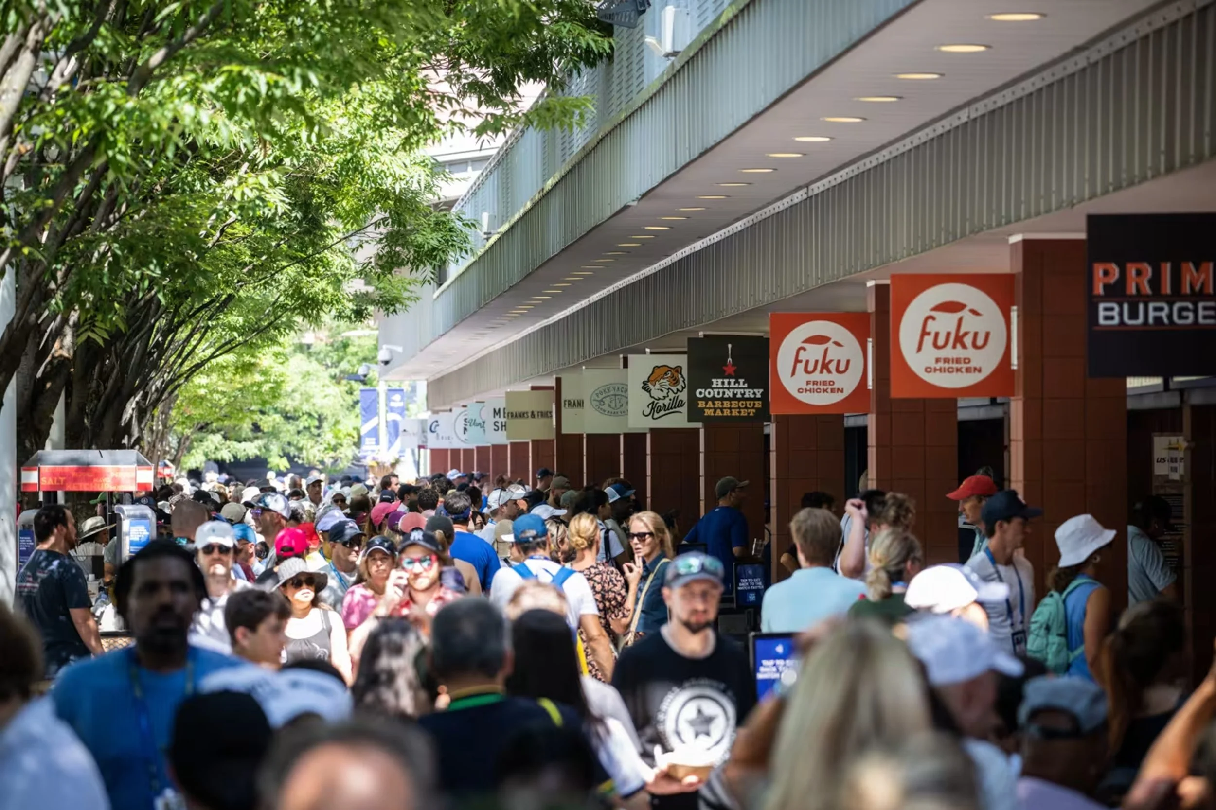 Hill Country projecting sign among the concessions in the crowded US Open Food Village.