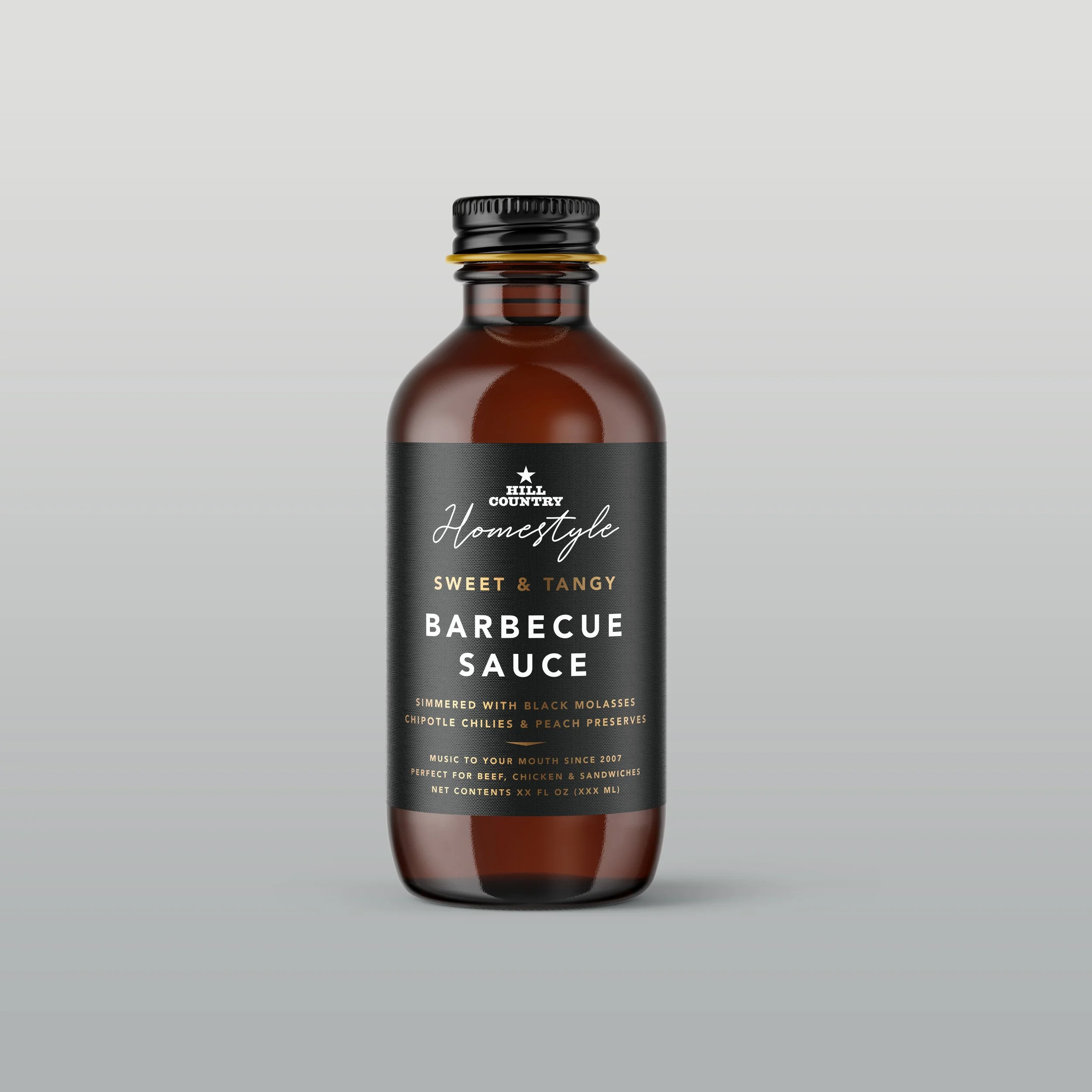 Hill Country Homestyle barbecue-sauce bottle concept with a black label and black cap.