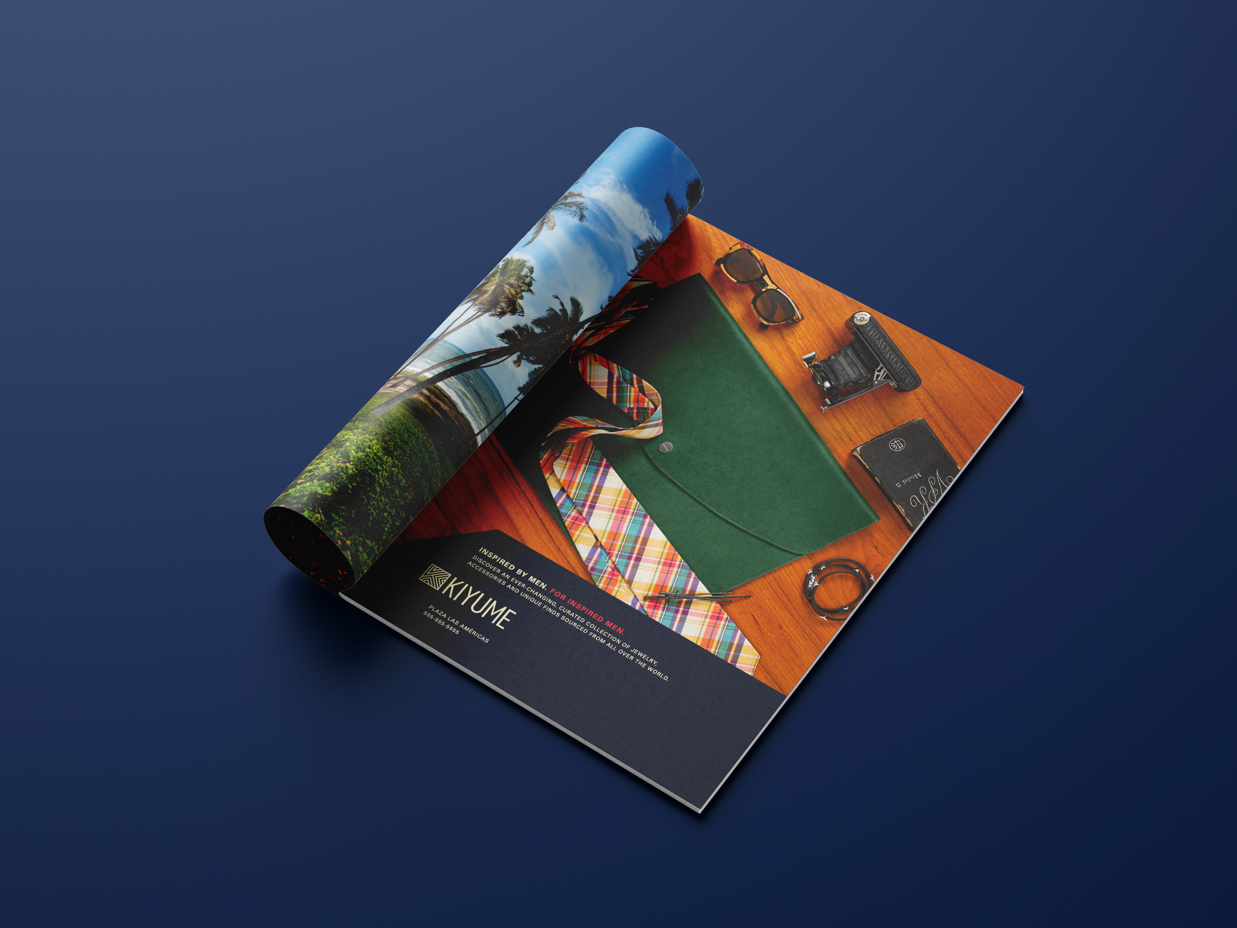 Kiyume magazine advertisement featuring a green leather folio, plaid tie, vintage camera and accessories.