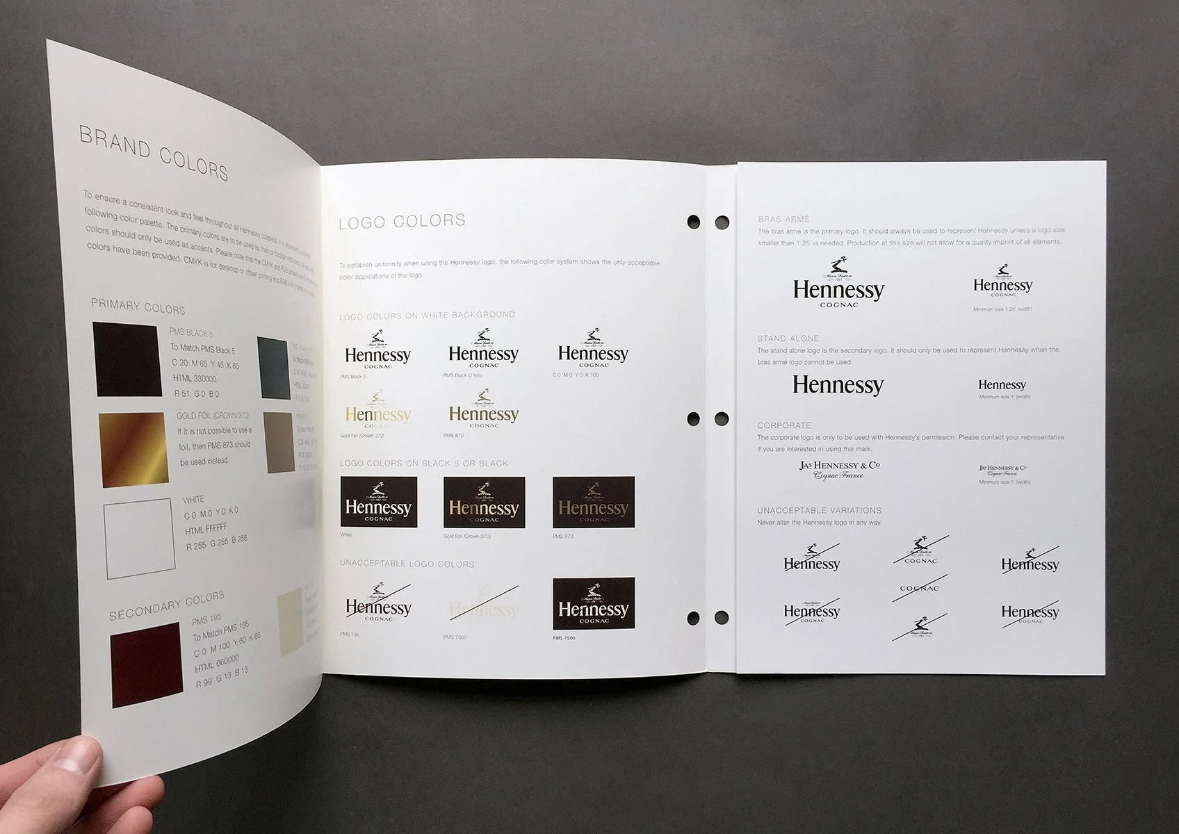 Hennessy brand guidelines showing color specifications, approved logo variations and examples of incorrect usage.