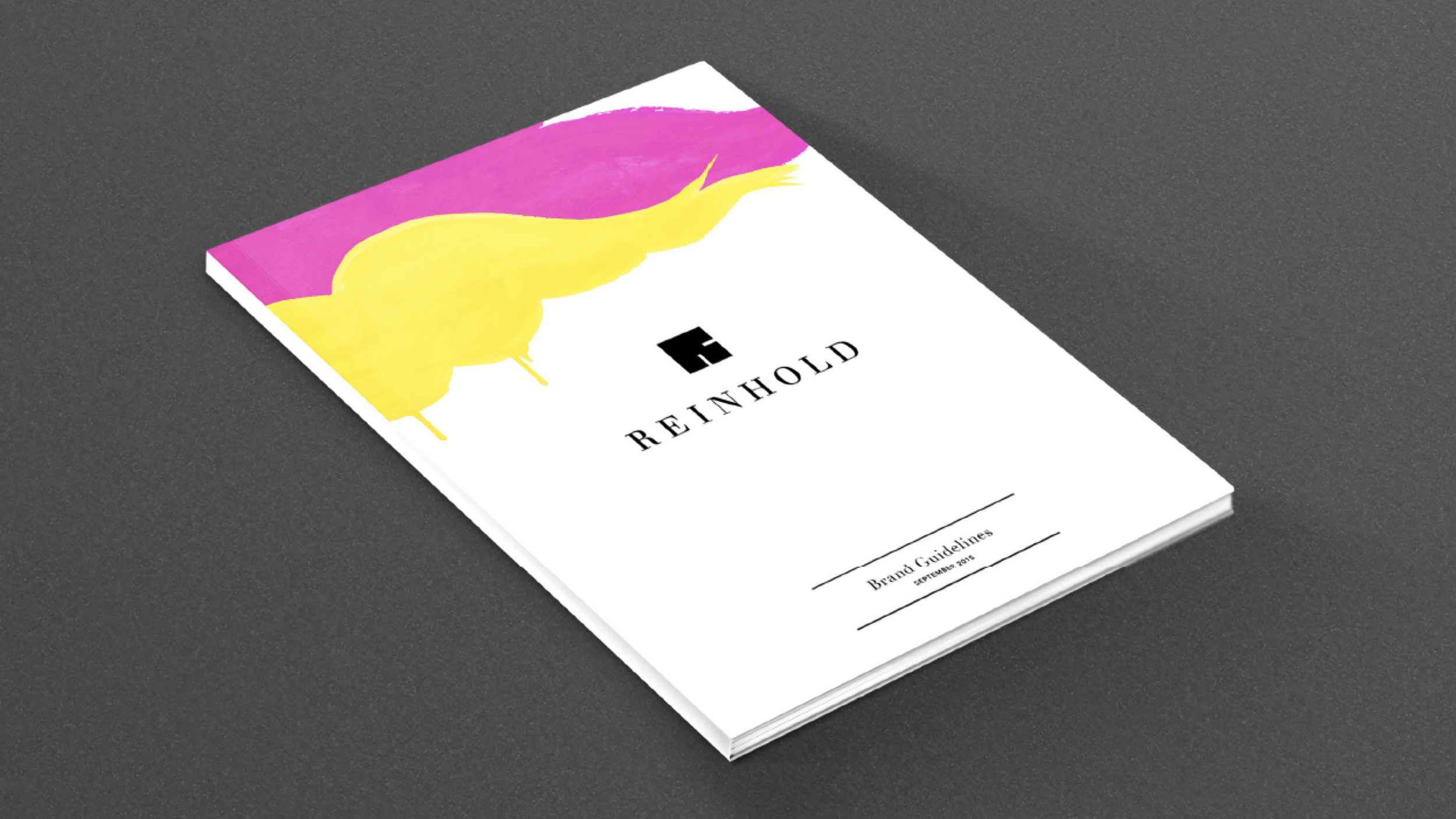Reinhold Jewelers brand guidelines cover with the logo and sweeping purple and yellow brushstrokes.