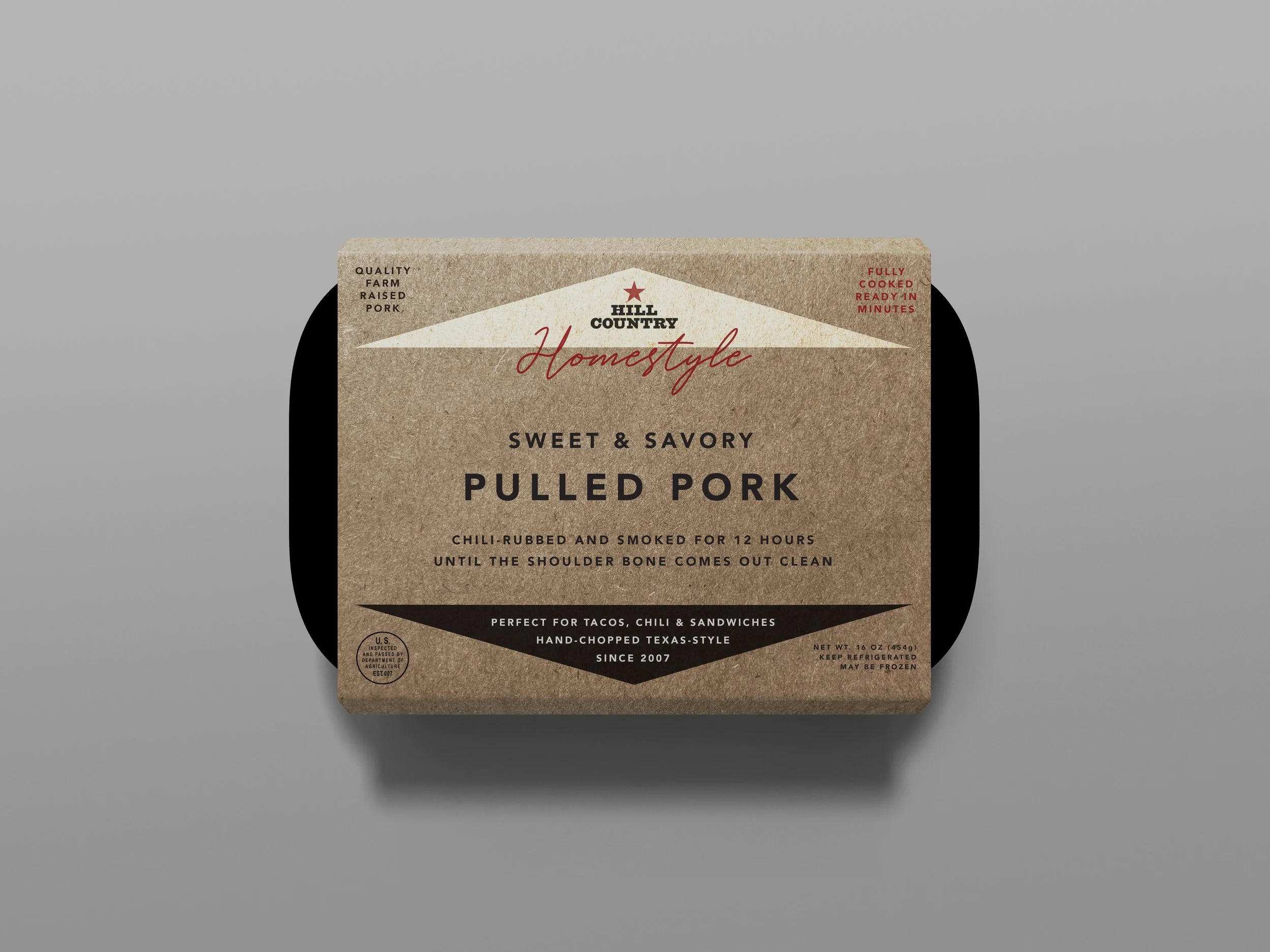 Hill Country Homestyle pulled-pork packaging concept with a kraft-paper sleeve around a black tray.