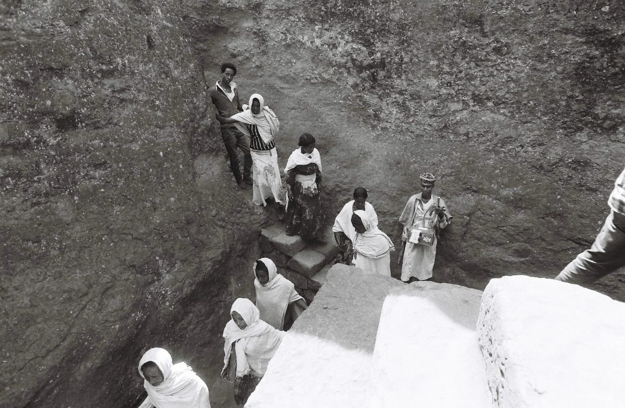 Pilgrims navigate the narrow tunnels which connect the sacred Churches of Lalibela.