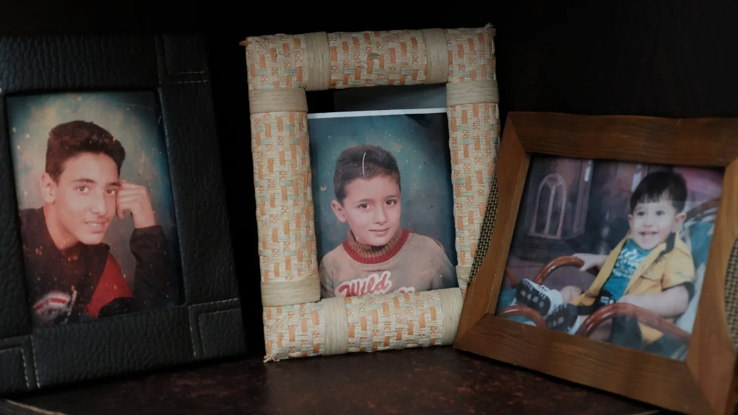 A childhood photo (center) of Mr. Abdalhade's son Mohammed who was recently arrested during a settler attack. Now 17-years-old, Mohammed has been in jail for over a month with little to no information shared with the family on his exact whereabouts. 
