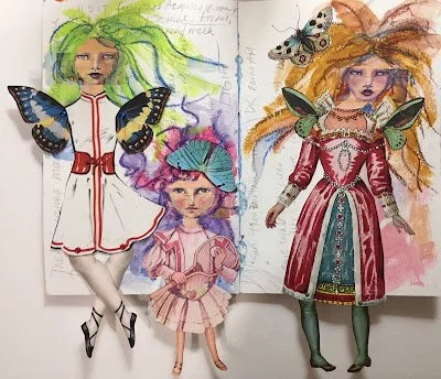 Colorful hand-drawn illustrations of three women with butterflies on their shoulders and heads, with vibrant hair colors and elegant clothing. A notebook or sketchbook page is visible behind the characters.