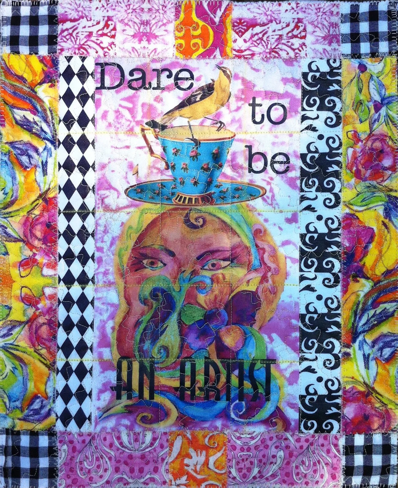 Colorful quilt with various patterns and designs, featuring the words "Dare to be in lust" and a large face with vibrant, swirling colors.