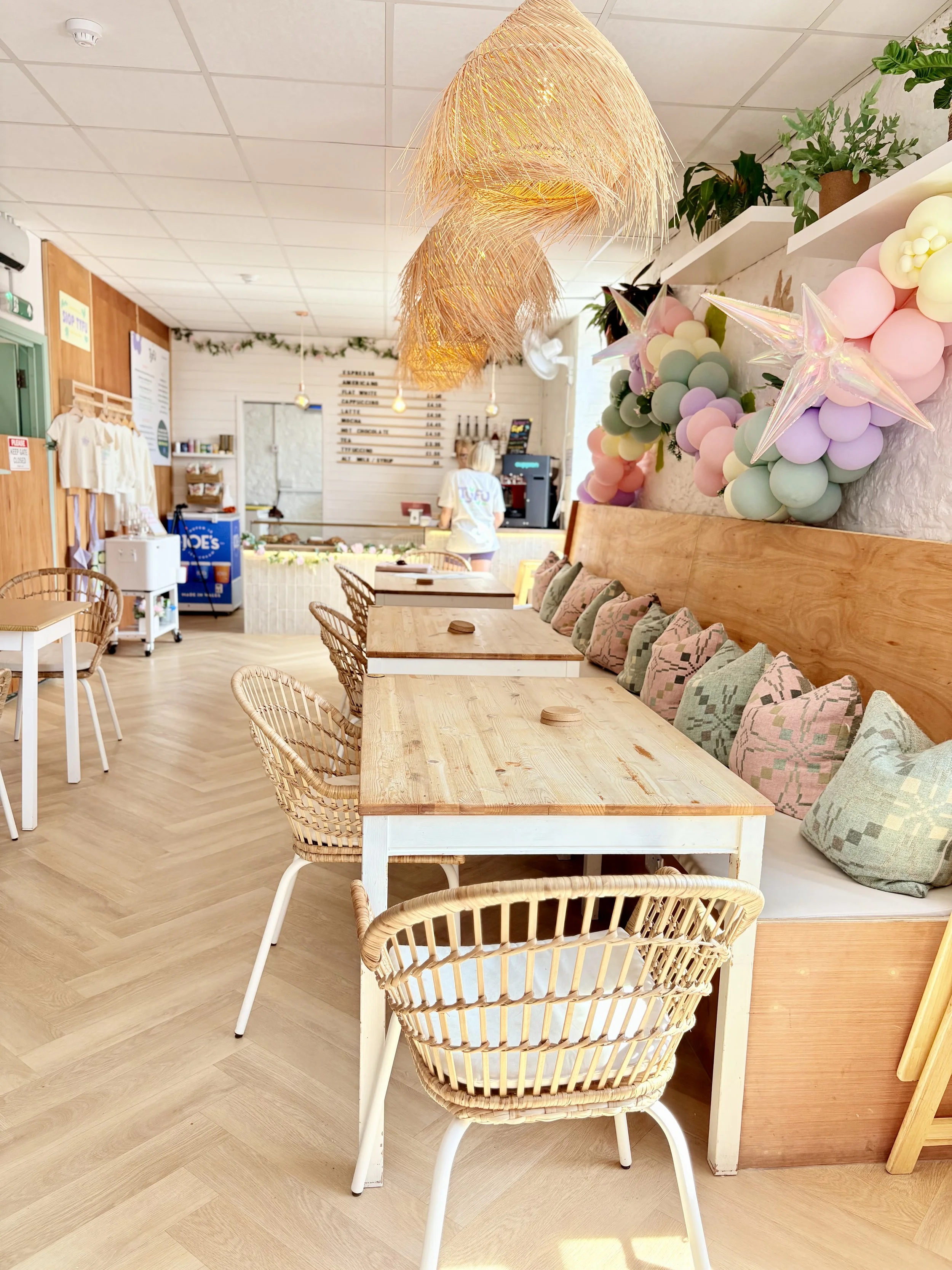 The seating area and cafe counter on the first floor of Tyfu Play, Whitchurch, Cardiff
