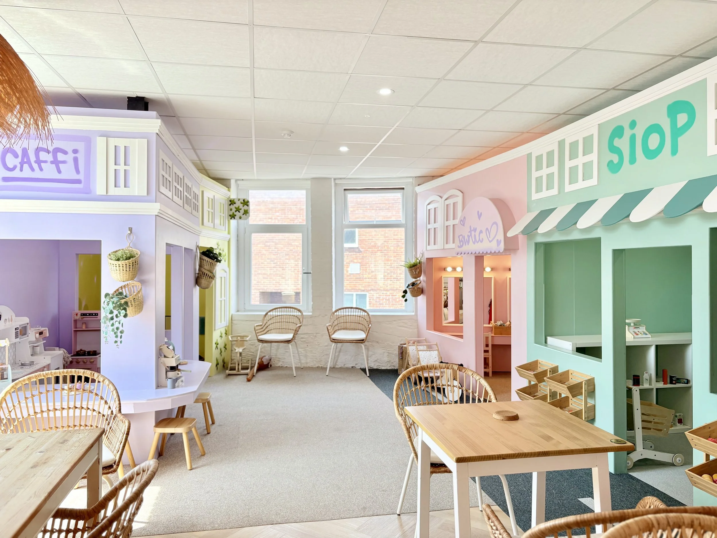 Image of cafe, boutique and shop within our role play area