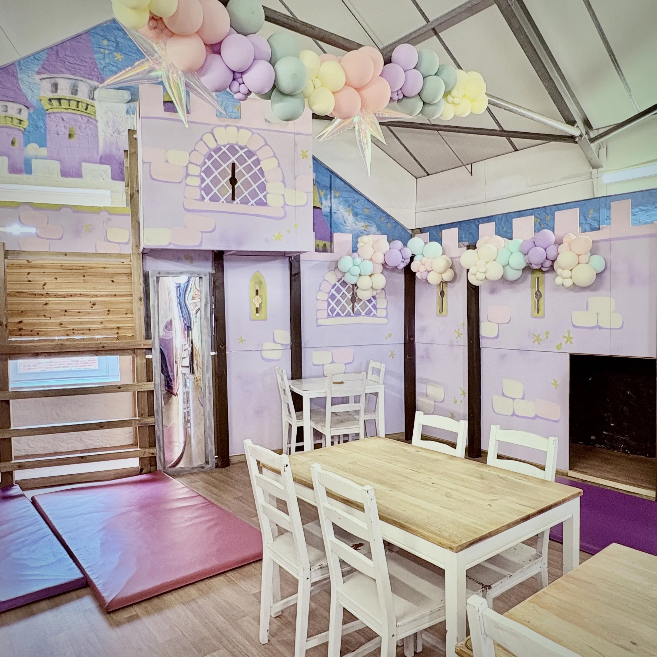 Wooden adventure castle play area on the second play floor.