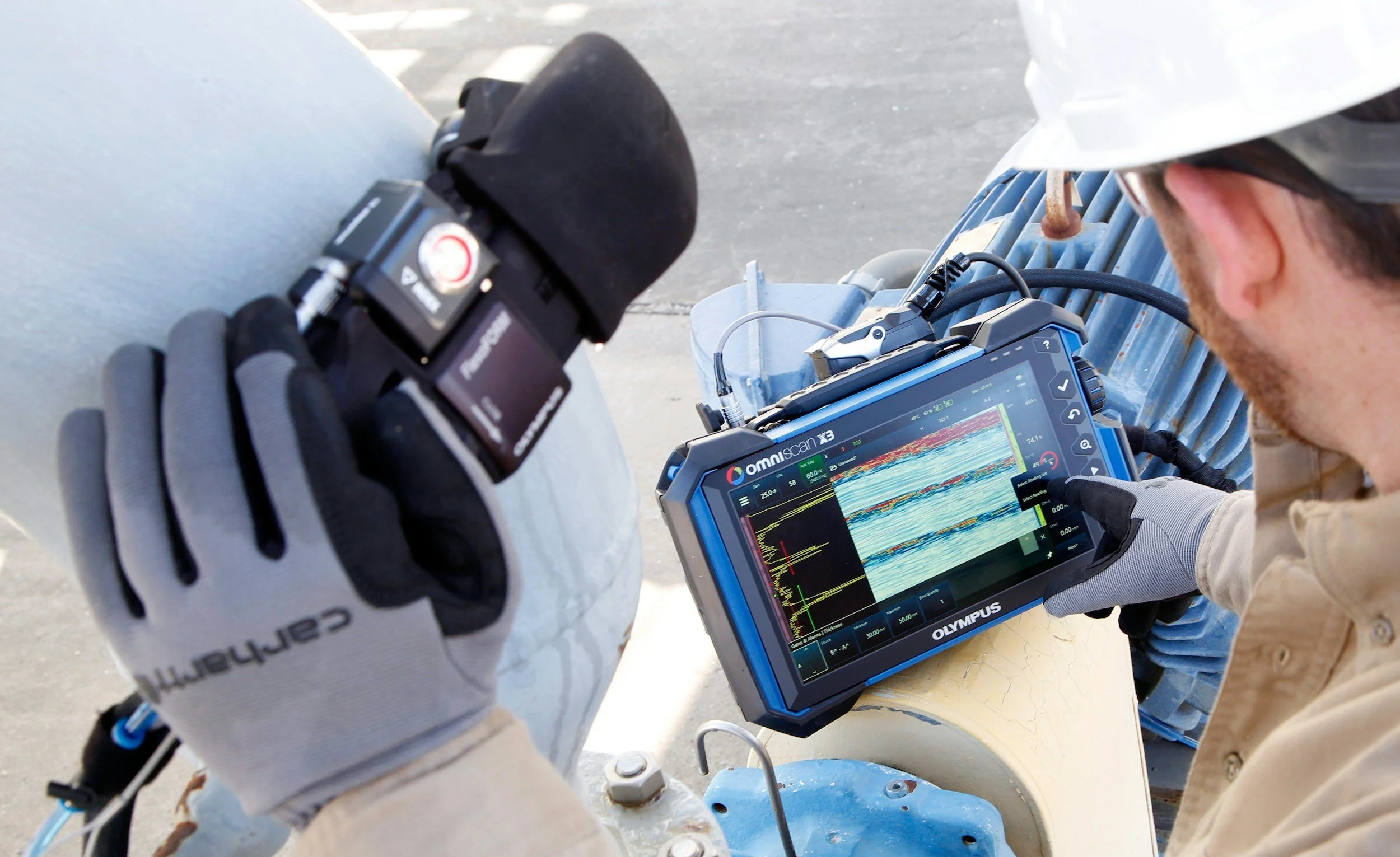 A water utility monitoring technician actively monitoring the water usage in in a building