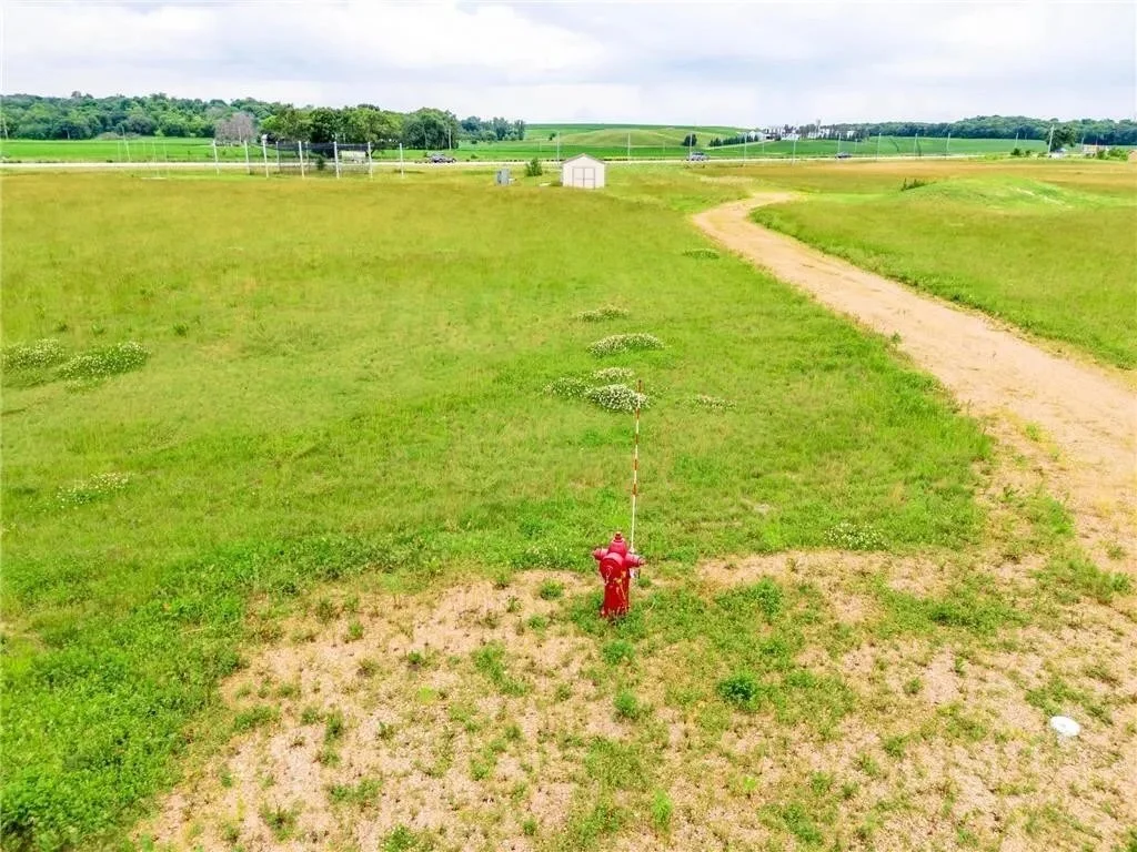 Commercial development land for sale near Minneapolis, MN at 1001 Commerce Dr W in Belle Plaine. 8.76-acre Twin Cities-area commercial property listed by Latitude 365 Advisors.