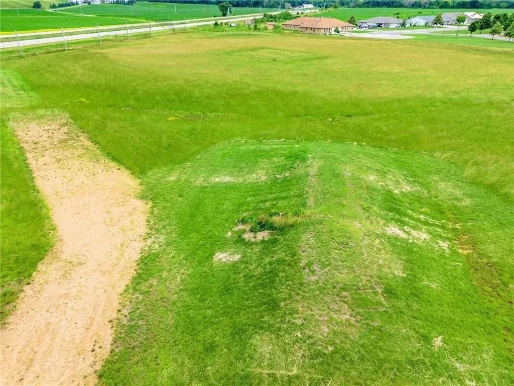 Commercial development land for sale near Minneapolis, MN at 1001 Commerce Dr W in Belle Plaine. 8.76-acre Twin Cities-area commercial property listed by Latitude 365 Advisors.