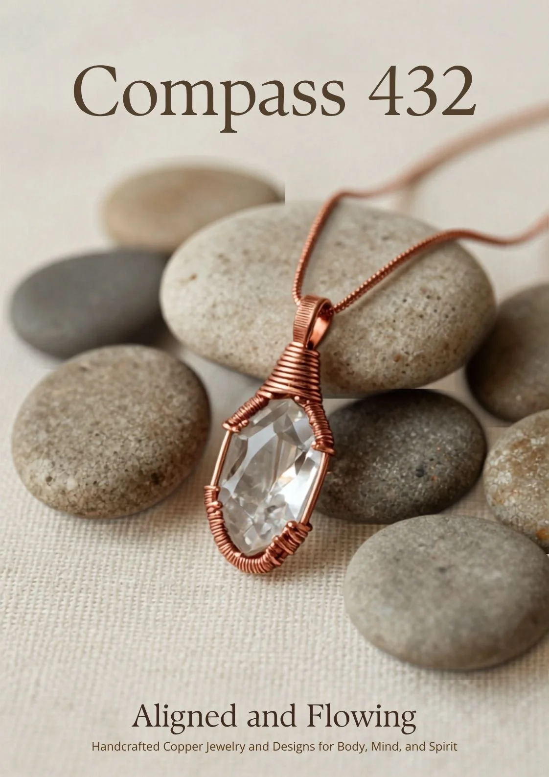A handcrafted copper necklace with a large clear gemstone pendant resting on a group of smooth, rounded stones. The image is part of a promotional poster titled 'Compass 432,' emphasizing aligned and flowing jewelry designs for body, mind, and spirit.