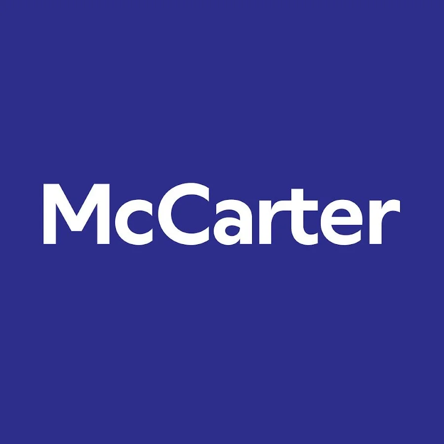 Blue background with white text displaying the word 'McCarter'