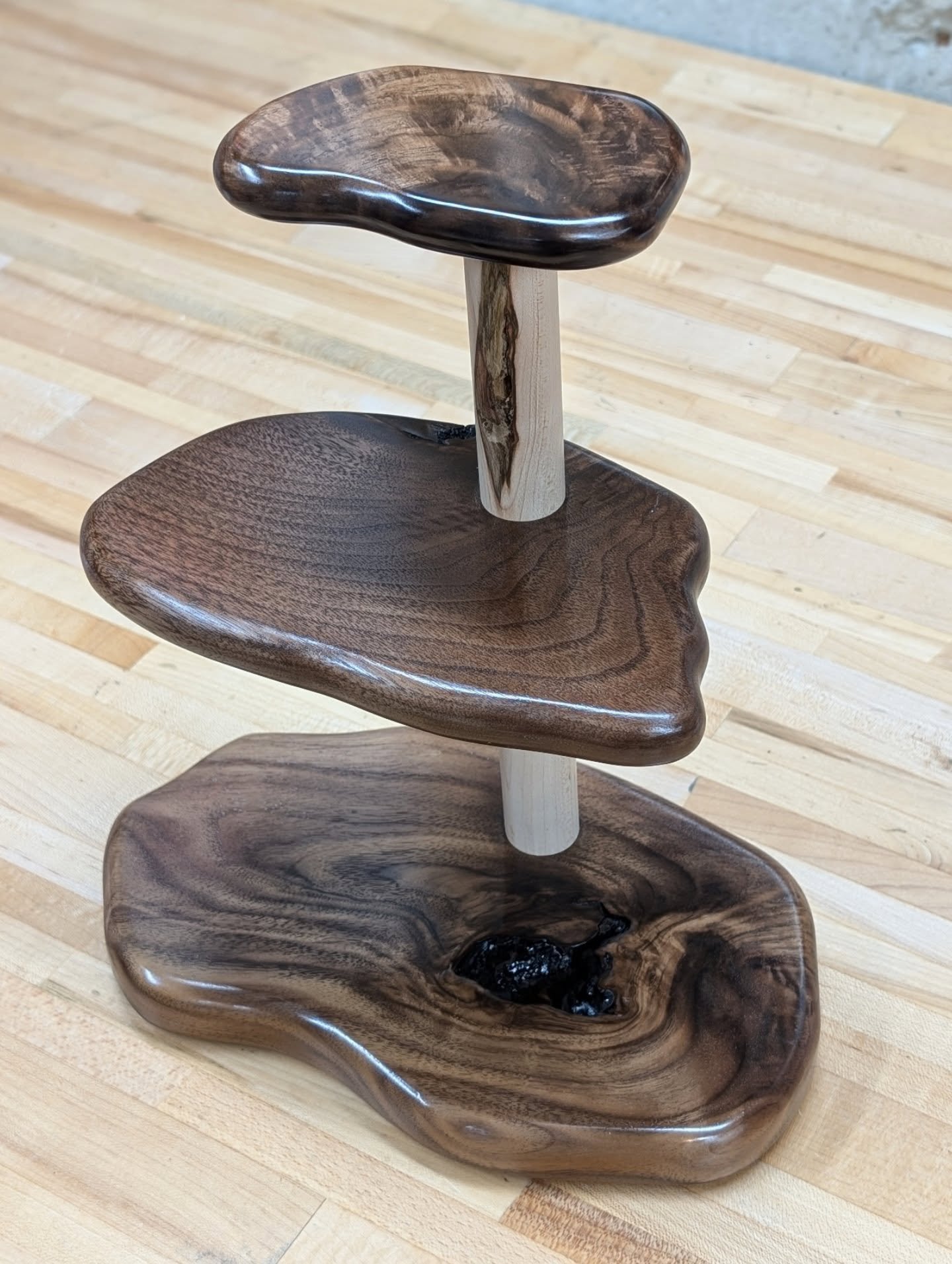 Perfume Tower 💨🗼
.
Flowing Walnut tiers tied together with a thicc Maple rod 🌰🍁
.
Inspiration by @wastelandbarbie ✨
Brand by @gearheartindustry 🔥
Finish by @varathane 🛡️
.
#woodworking #walnut #maple #perfume #handmade