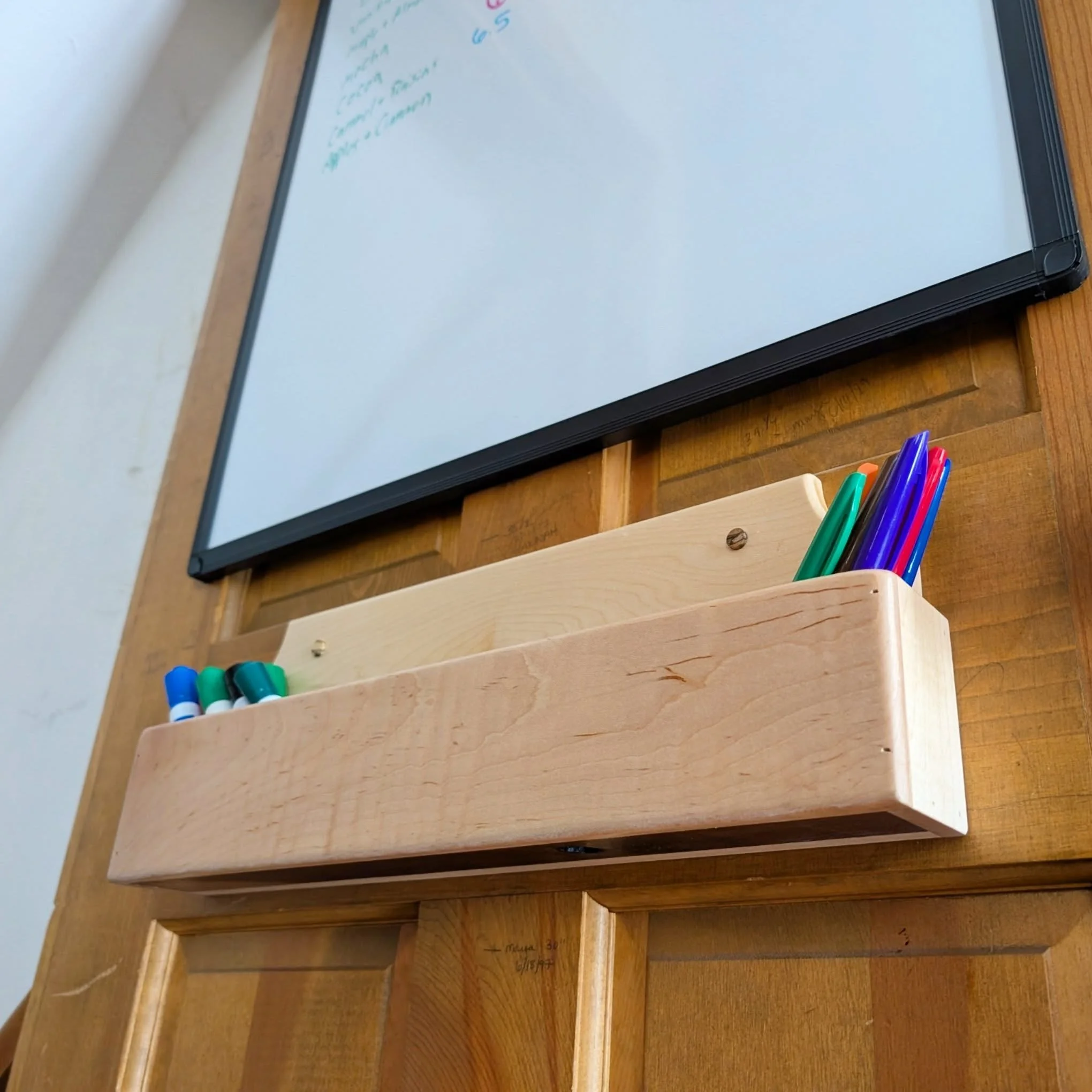 Whiteboard Marker Box ⬜🎨📦
.
Maple &amp; Walnut 🍁🌰
Long and shallow so it wouldn't stick out too awkwardly since it's on the back of a door 🚪 
.
Clamps by @pony_jorgensen 🗜️
.
#woodworking #maple #walnut #handmade #custom