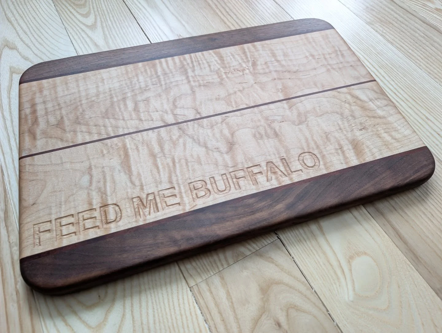 Maple, Walnut &amp; Cherry Board 🍁🌰🍒
.
This beautifully figured board was for Gina, AKA Feed Me Buffalo; a fantastic foodie who specializes in eats from my hometown of Buffalo, NY! 🍽️🦬
Check her out at @feedme_buffalo 👀
.
One of the first times