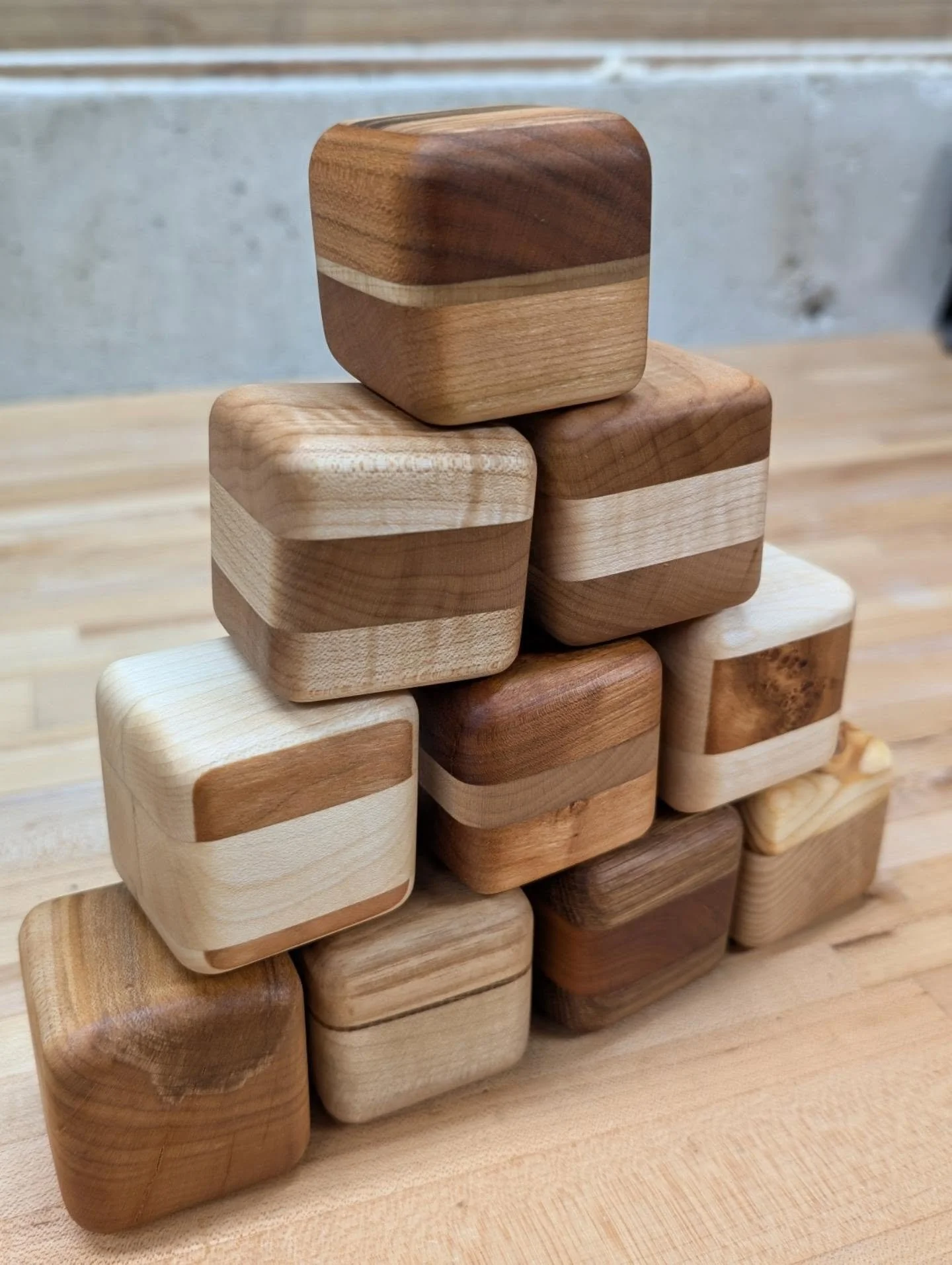 Wobble Blocks! 🫨🟫🟧🟨
.
I haven't posted in a bit because of who these are for - a brand new little shop assistant has arrived! 🐣 Seen in the last two pics 📸
.
These 2"x2" blocks are made almost entirely out of scraps and offcuts, so th