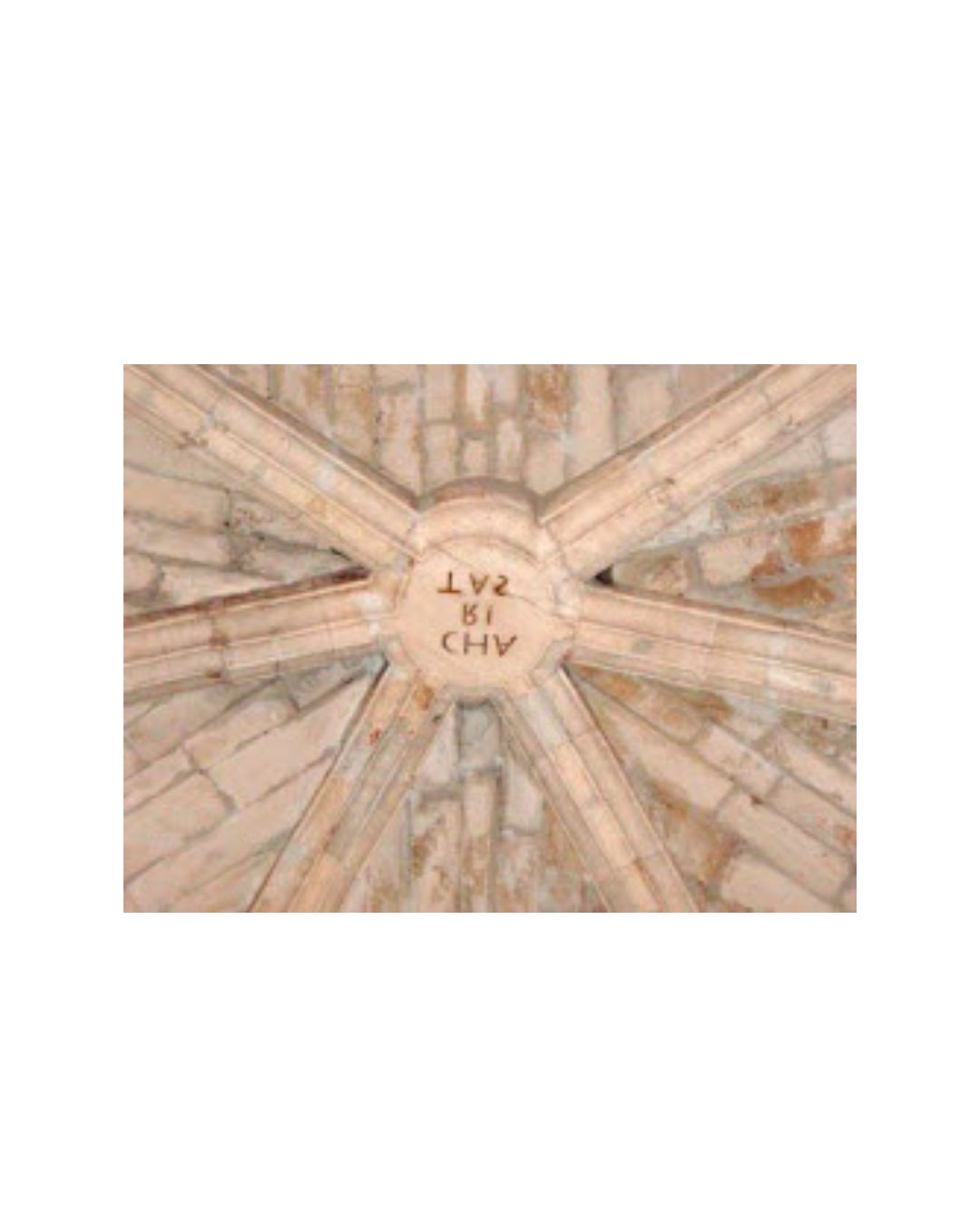 Ceiling with stone ribs and a central engraved plaque reading 'A D 19 SAT'.