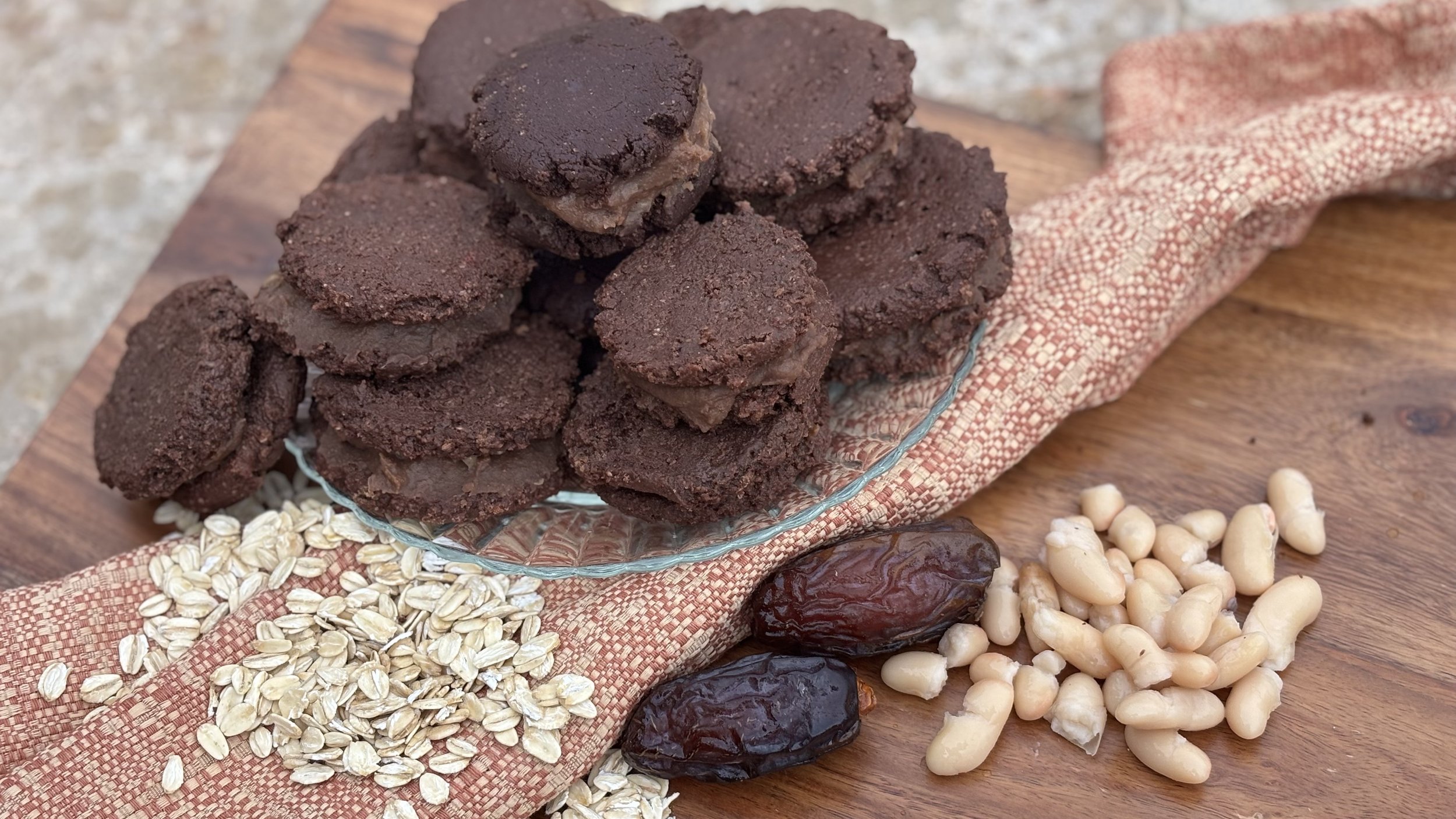 Healthy Fudgy Chocolate Sandwich Cookies made with whole-food, plant-based, gluten-free ingredients and filled with a rich, creamy chocolate filling.