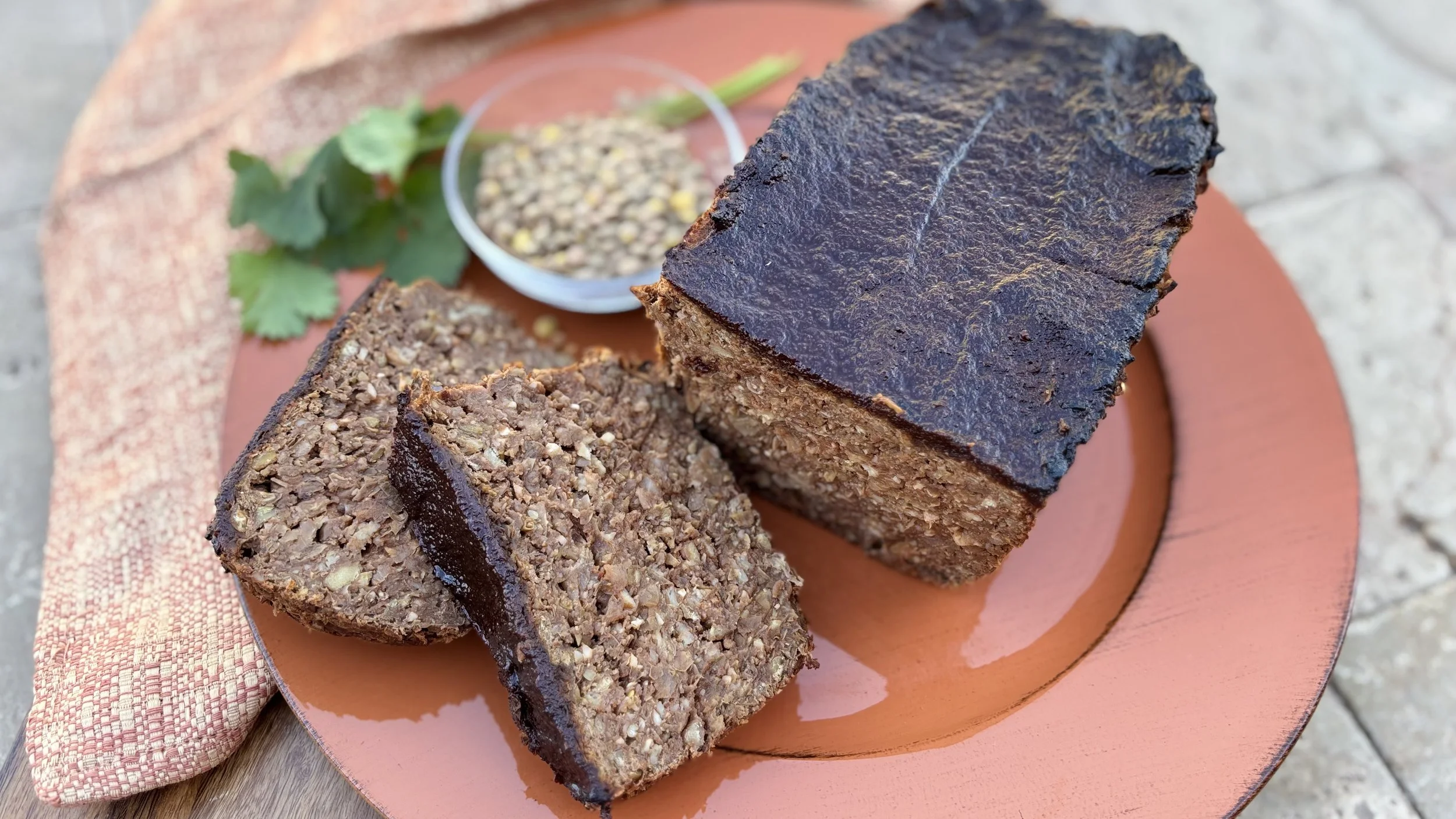 Healthy Lentil Loaf made with whole-food, plant-based, gluten-free ingredients, served sliced and ready to enjoy.