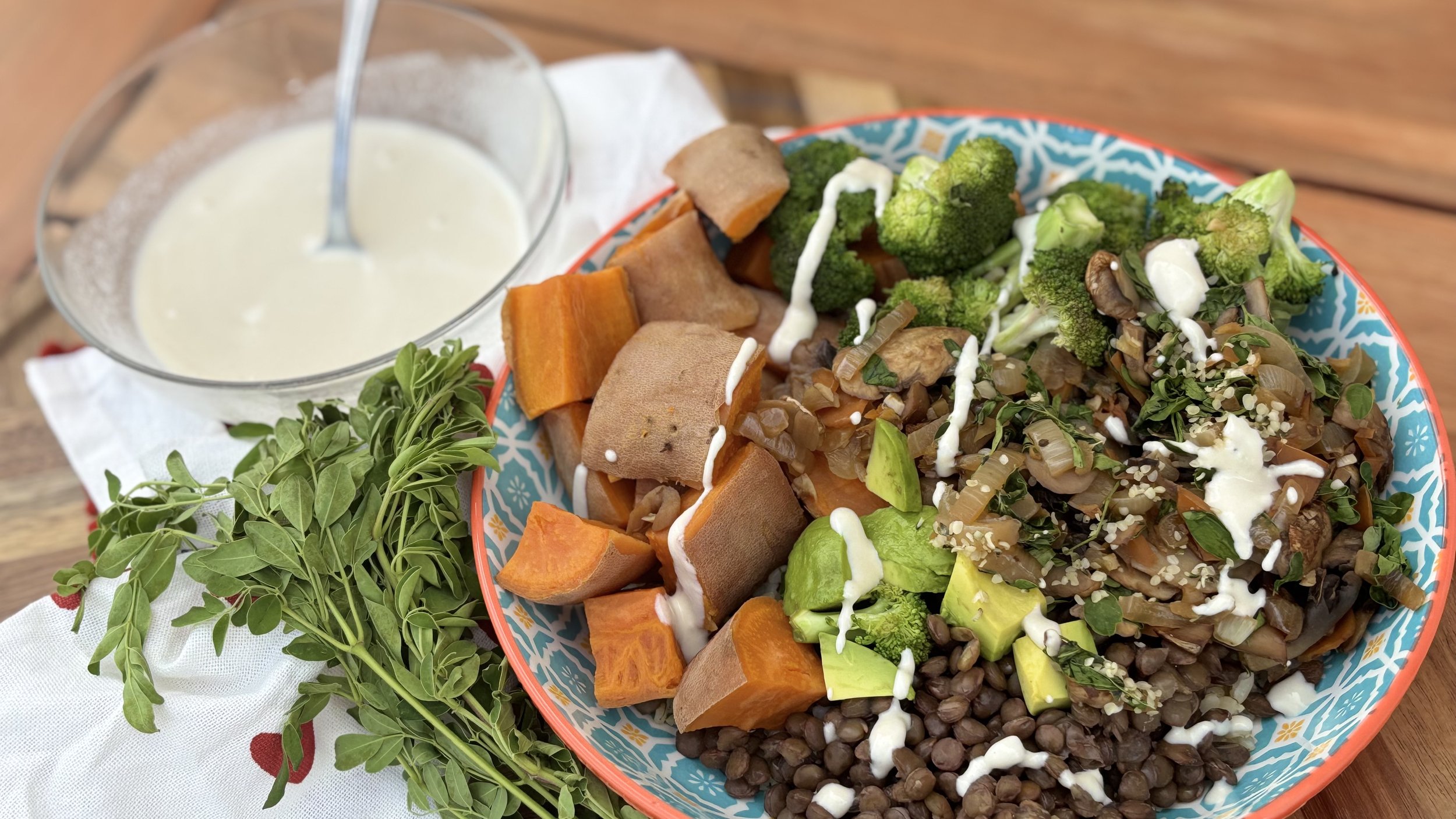 Moringa & Lentil Nourish Bowl made with whole-food, plant-based, gluten-free ingredients, featuring lentils, fresh vegetables, moringa, and wholesome toppings for a nourishing meal.