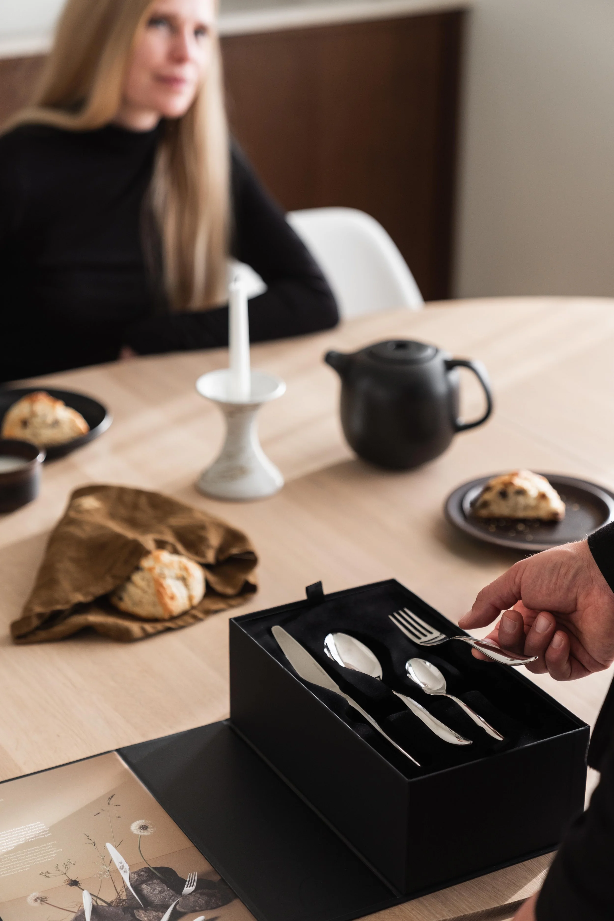 Hardanger Bestikk packaging styled on a kitchen surface, styling by Catrine Svellingen