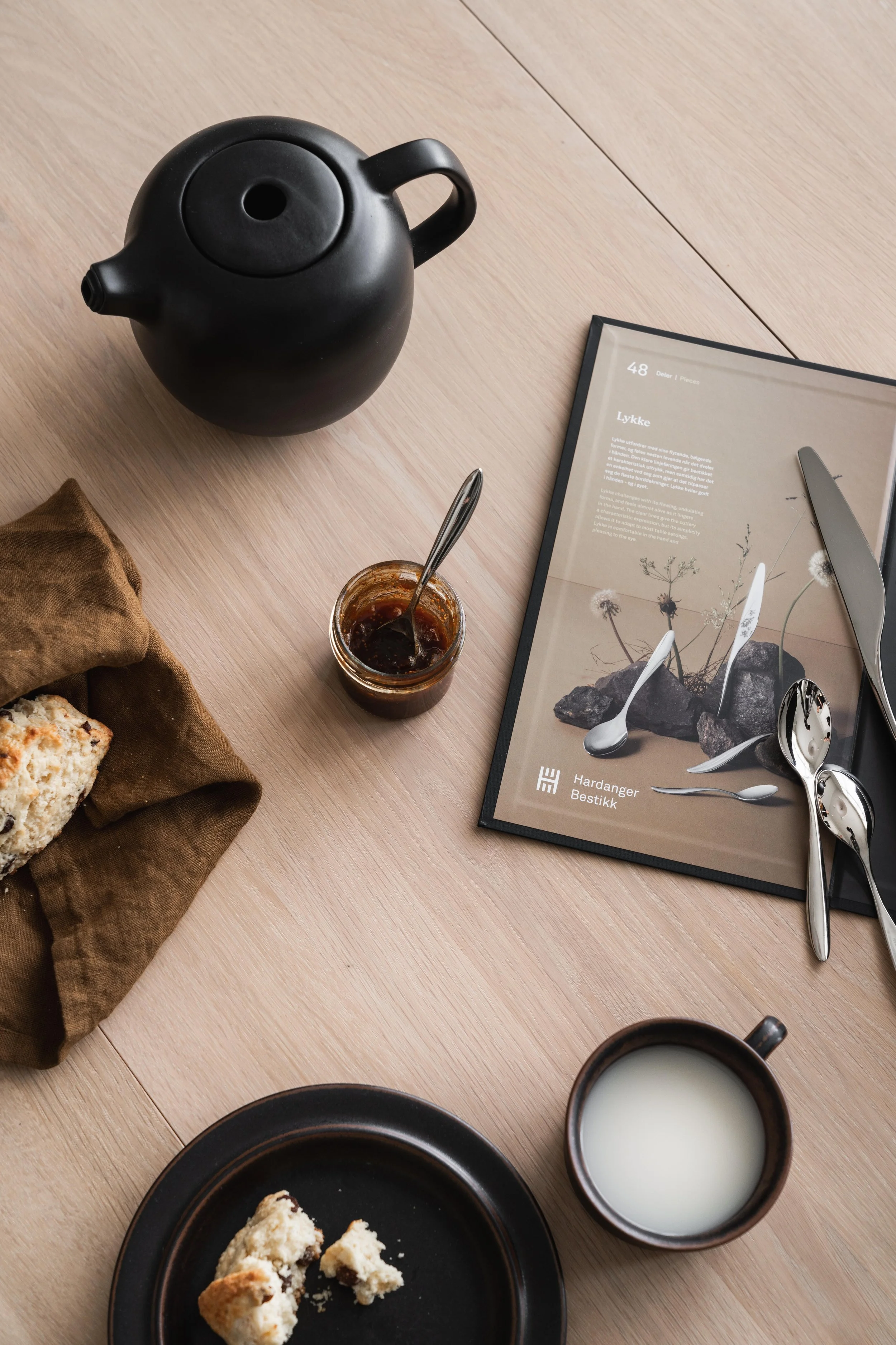 Hardanger Bestikk packaging styled on a kitchen surface, styling by Catrine Svellingen