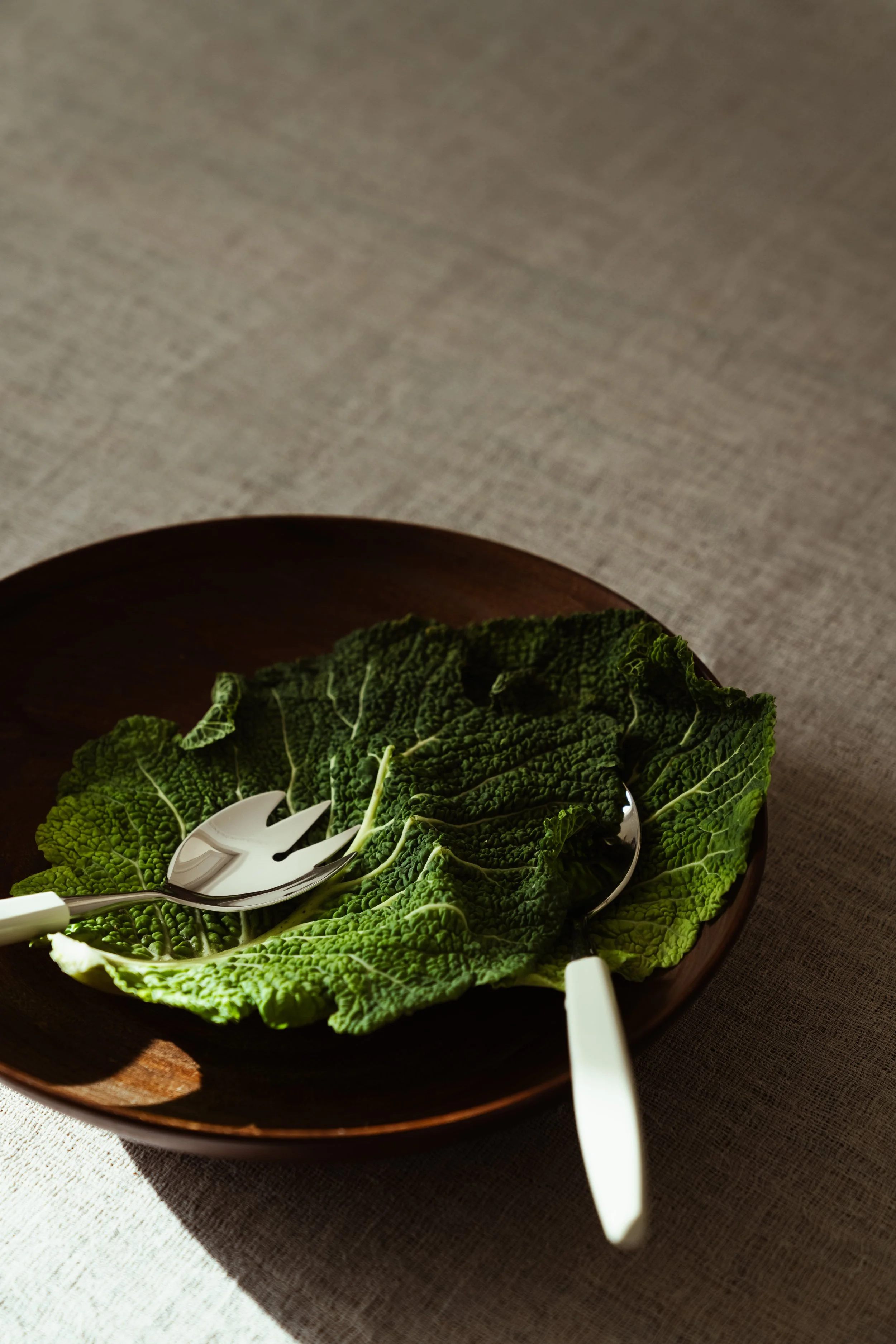 Skaugum of Norway handcrafted cutlery in a calm tabletop composition, styling Catrine Svellingen