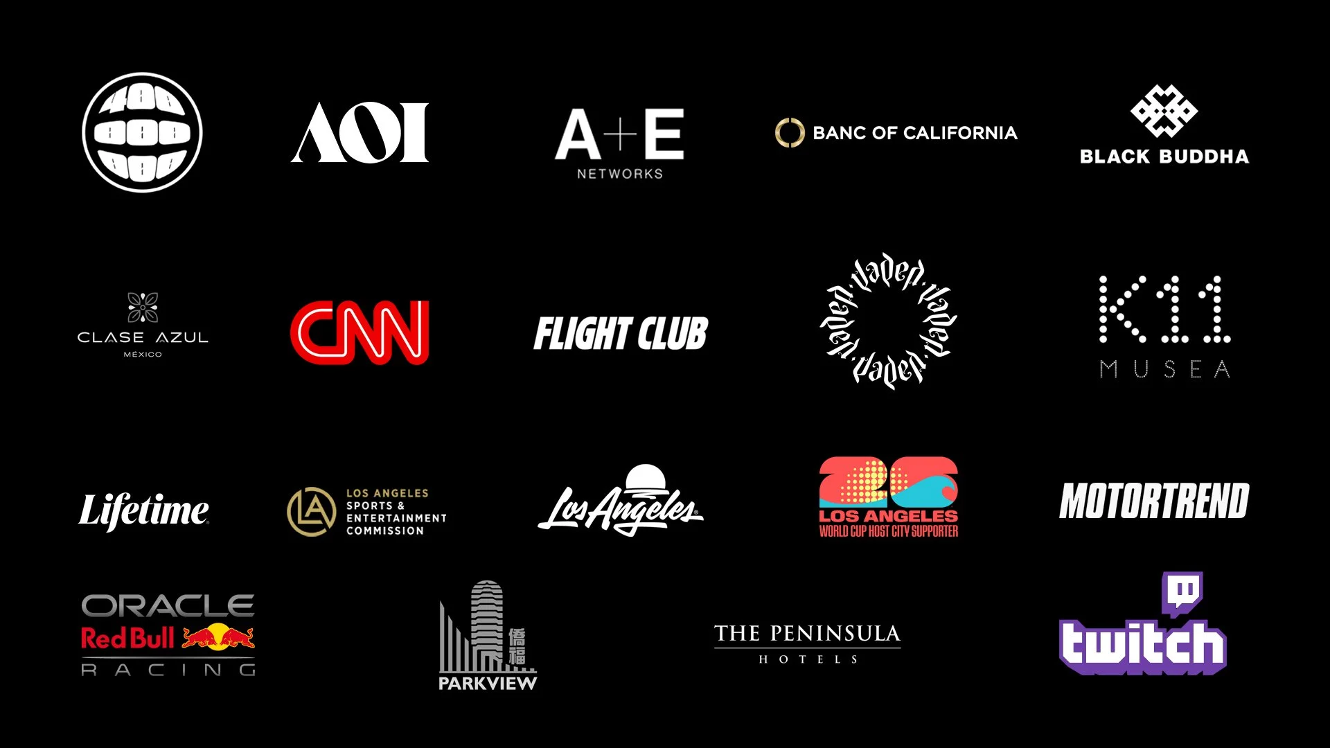 Collection of various logos on a black background, including media, entertainment, sports, hotel, and corporate brands like CNN, Red Bull Racing, Twitch, and LA
