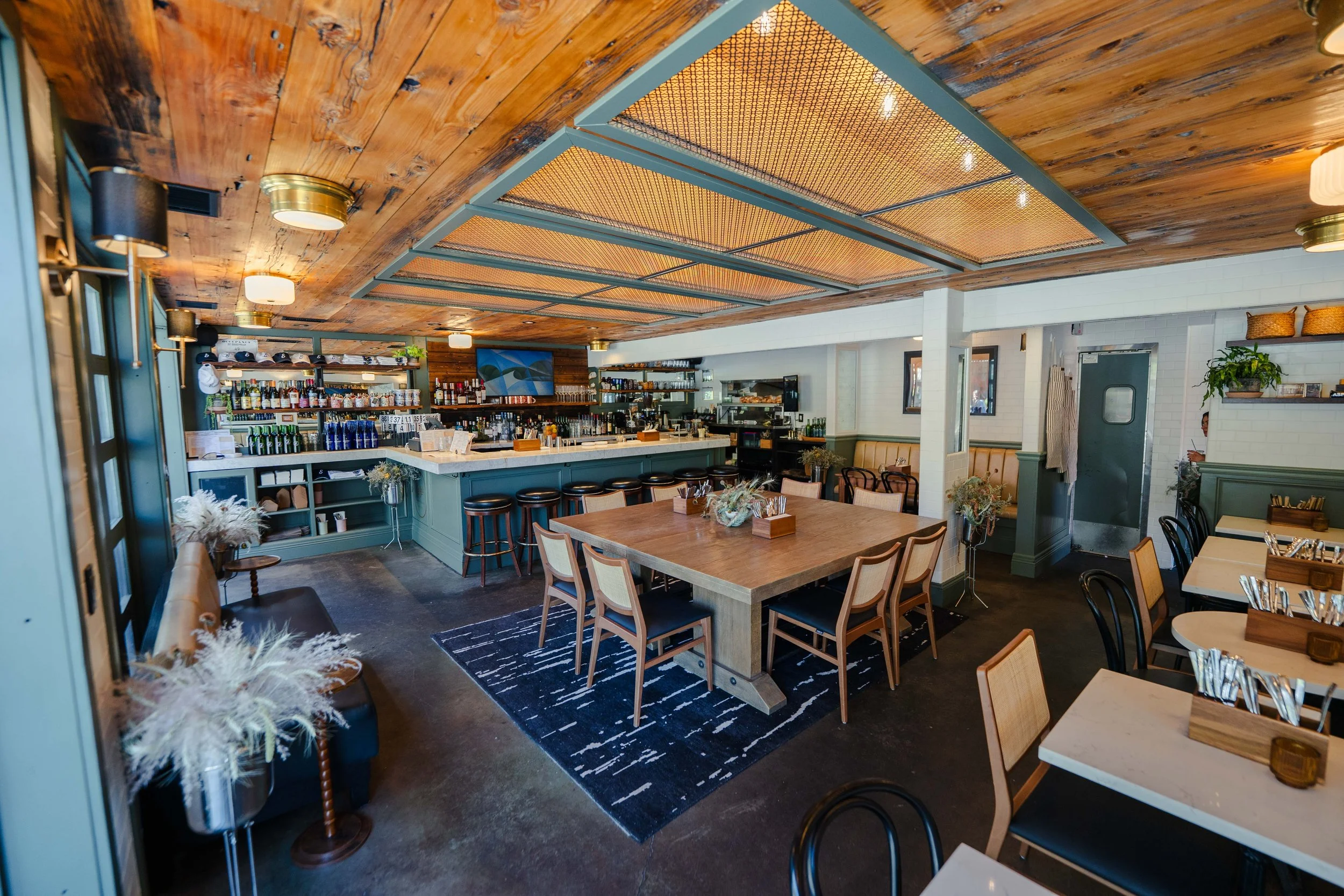 Cozy private event space at Eddy’s Kitchen in downtown Aspen, featuring an intimate restaurant and full-service bar available for private parties, cocktail hours, celebrations, bridal events, corporate gatherings, and special occasions.
