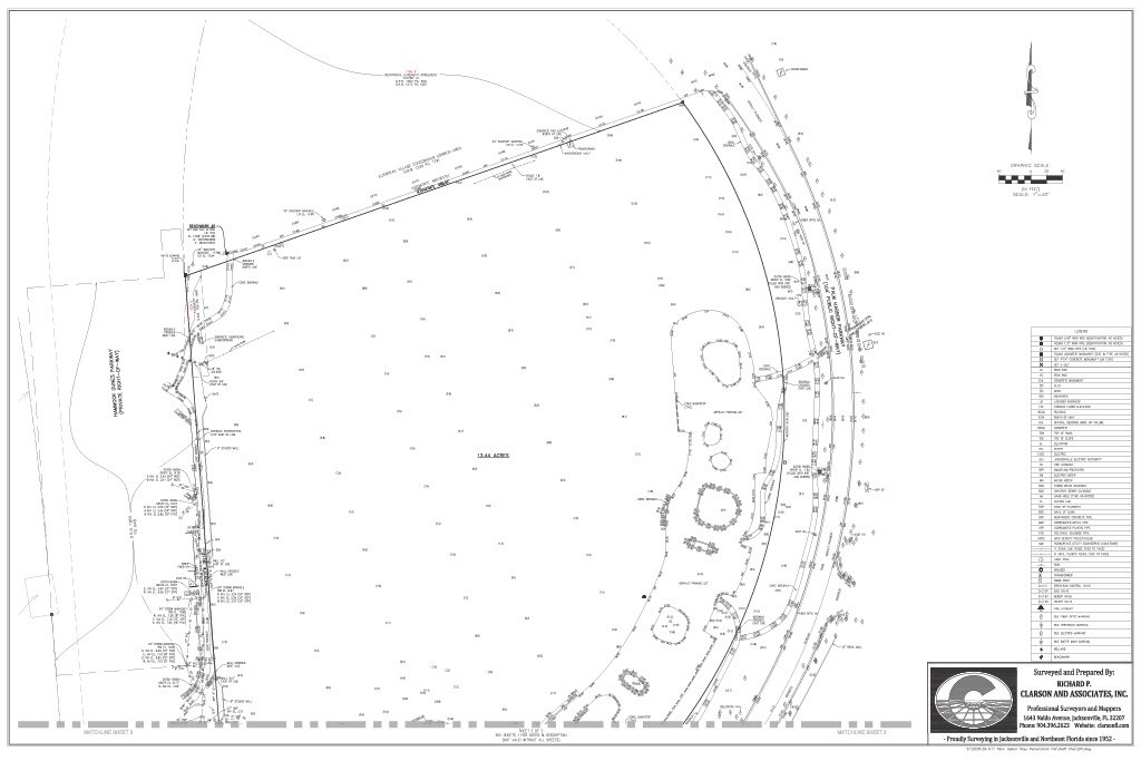 A detailed construction or land survey map showing lot boundaries, measurements, topographical features, and utility placements with a north directional arrow.