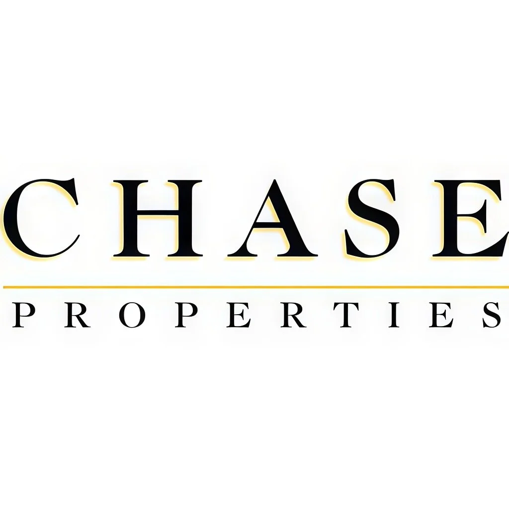 Chase Properties logo with the words 'CHASE' in large black and gold letters and 'PROPERTIES' in smaller black letters beneath, separated by a thin yellow line.