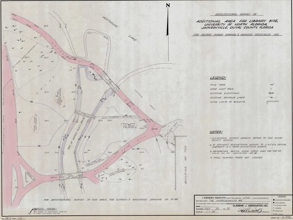 Architectural survey map depicting land survey details for a university library site expansion at the University of North Florida, Jacksonville, Florida, including elevation and contour lines, existing roads, and trees by Clarson and Associates, Inc.