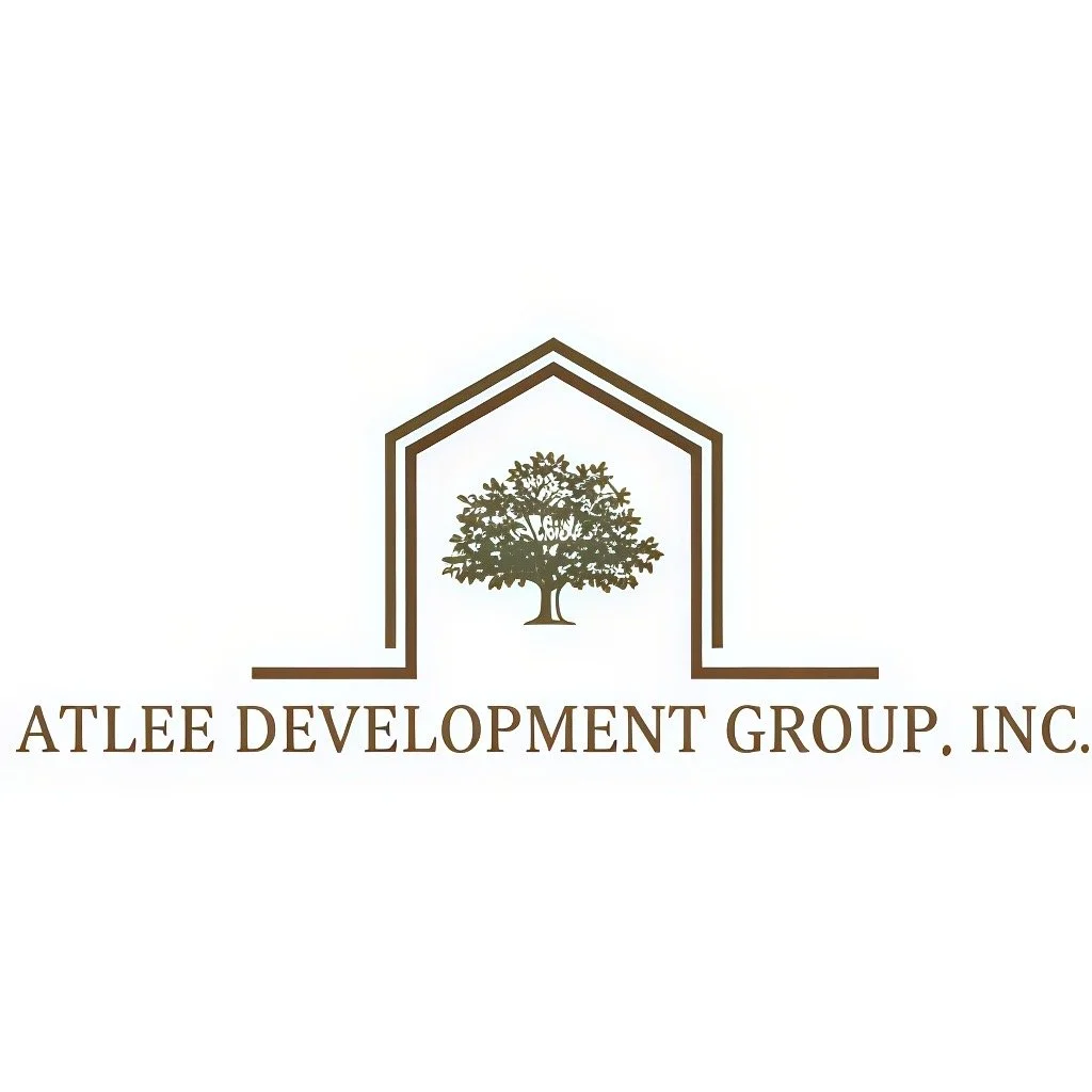 Logo of Atlee Development Group Inc. featuring a house outline and a tree inside.